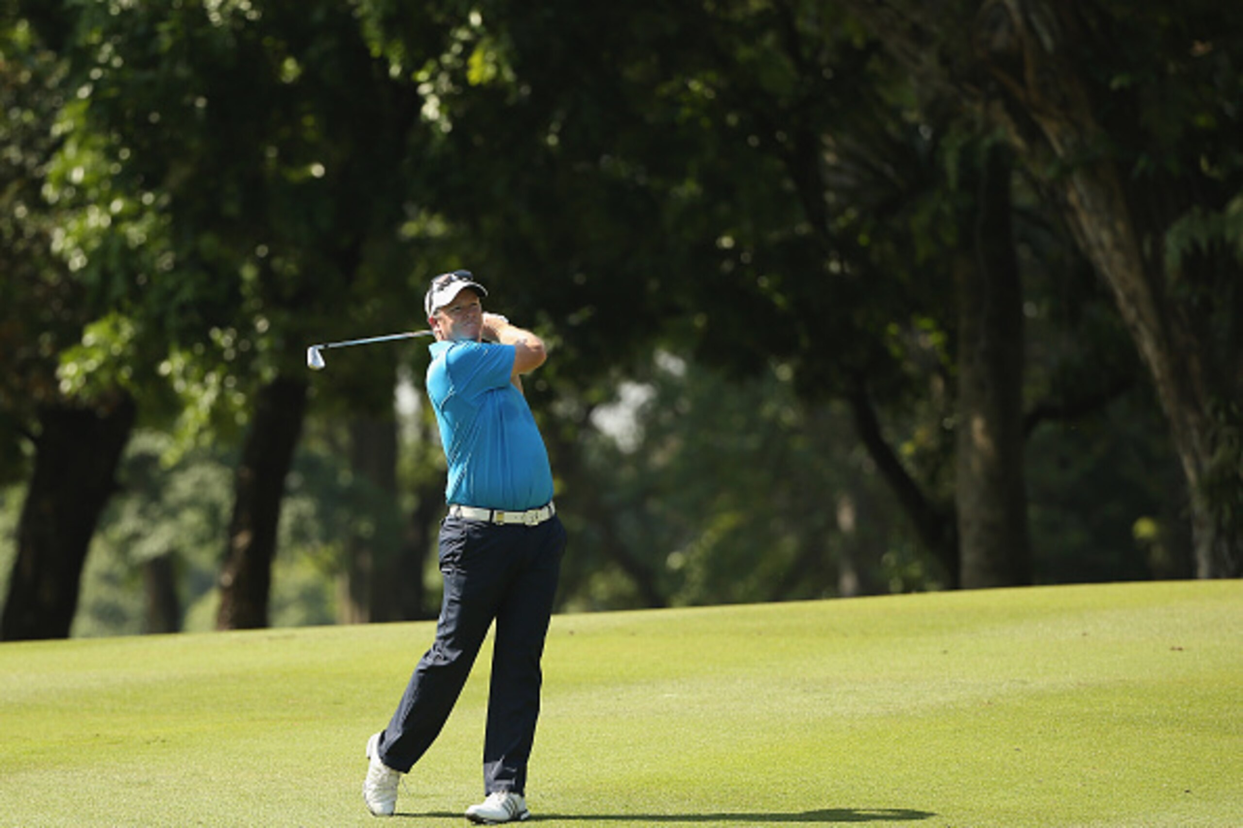 KUALA LUMPUR, MALAYSIA - FEBRUARY 21:  Marcus Fraser of Australia in action during the fourth round of the Maybank Championship Malaysia at Royal Selangor Golf Club on February 21, 2016 in Kuala Lumpur, Malaysia.  (Photo by Ian Walton/Getty Images)