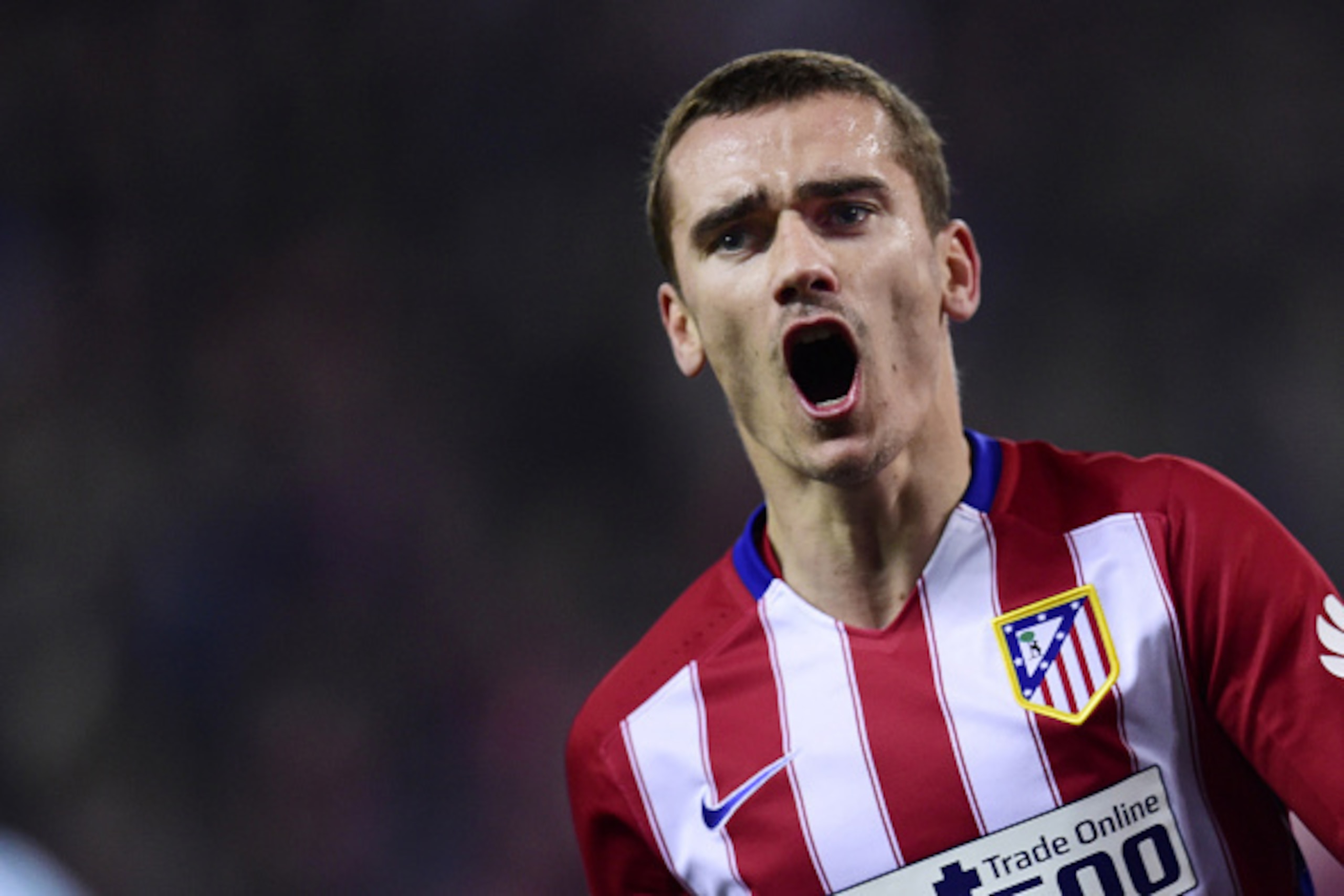 Atletico Madrid's French forward Antoine Griezmann celebrates after scoring a goal during the Spanish Copa del Rey (King's Cup) quarterfinal second leg football match Club Atletico de Madrid vs RC Celta de Vigo at the Vicente Calderon stadium in Madrid on