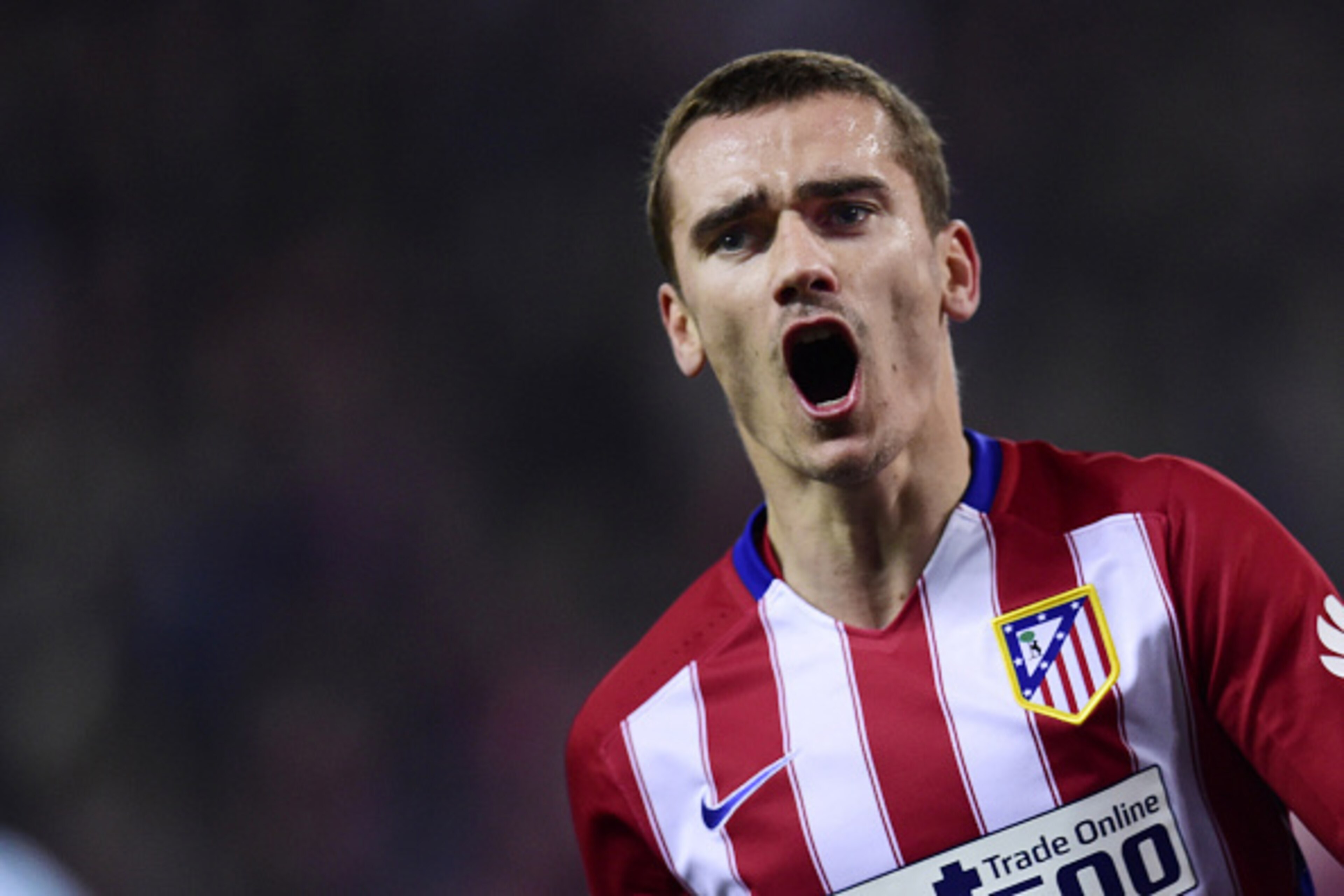 Atletico Madrid's French forward Antoine Griezmann celebrates after scoring a goal during the Spanish Copa del Rey (King's Cup) quarterfinal second leg football match Club Atletico de Madrid vs RC Celta de Vigo at the Vicente Calderon stadium in Madrid on