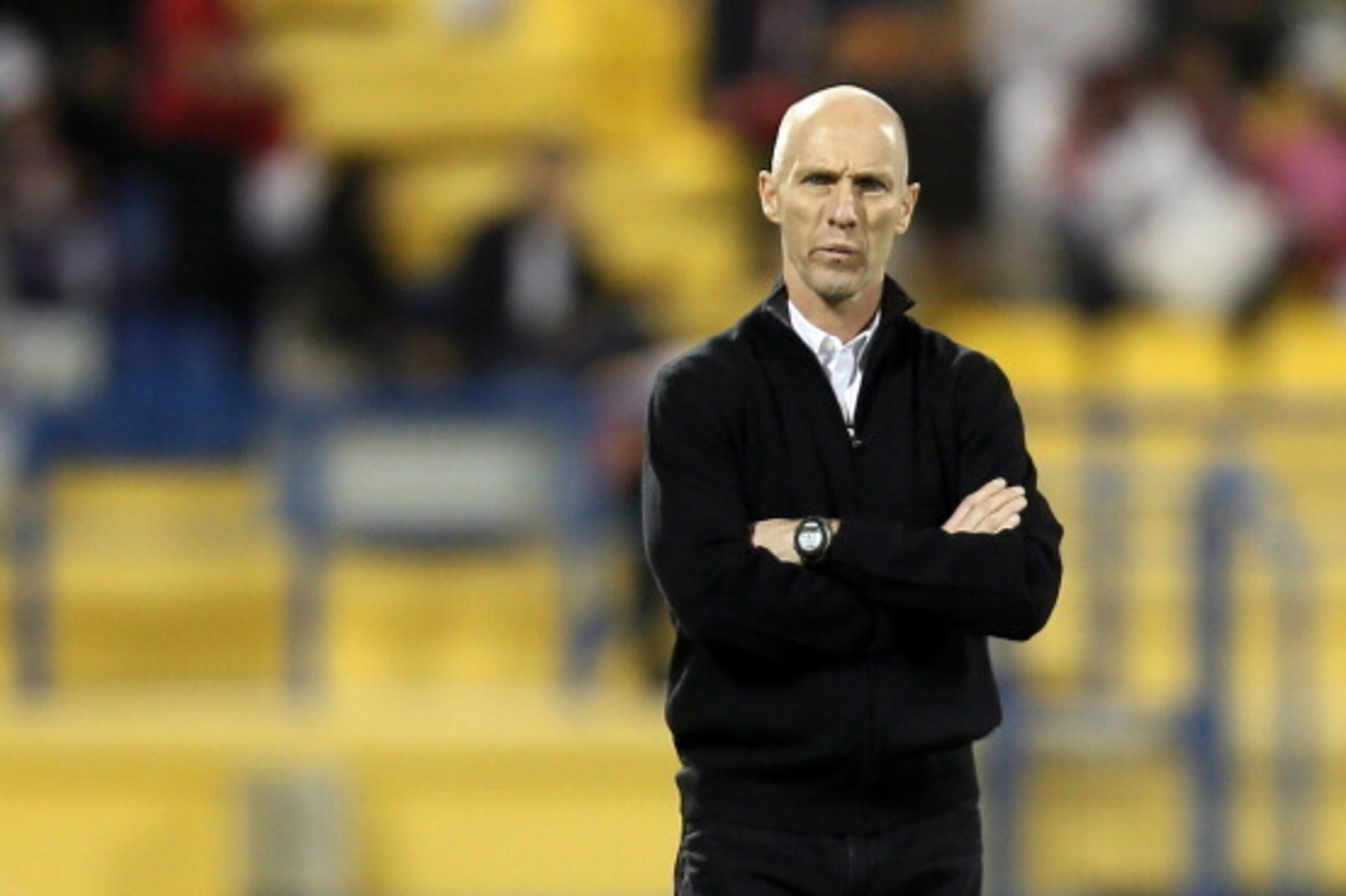Egypt's US coach Bob Bradley watches his players during their friendly football match against Qatar in the Qatari capital Doha on March 7, 2013. The match comes in the frame of the both national teams preparation for Asian and African qualification rounds