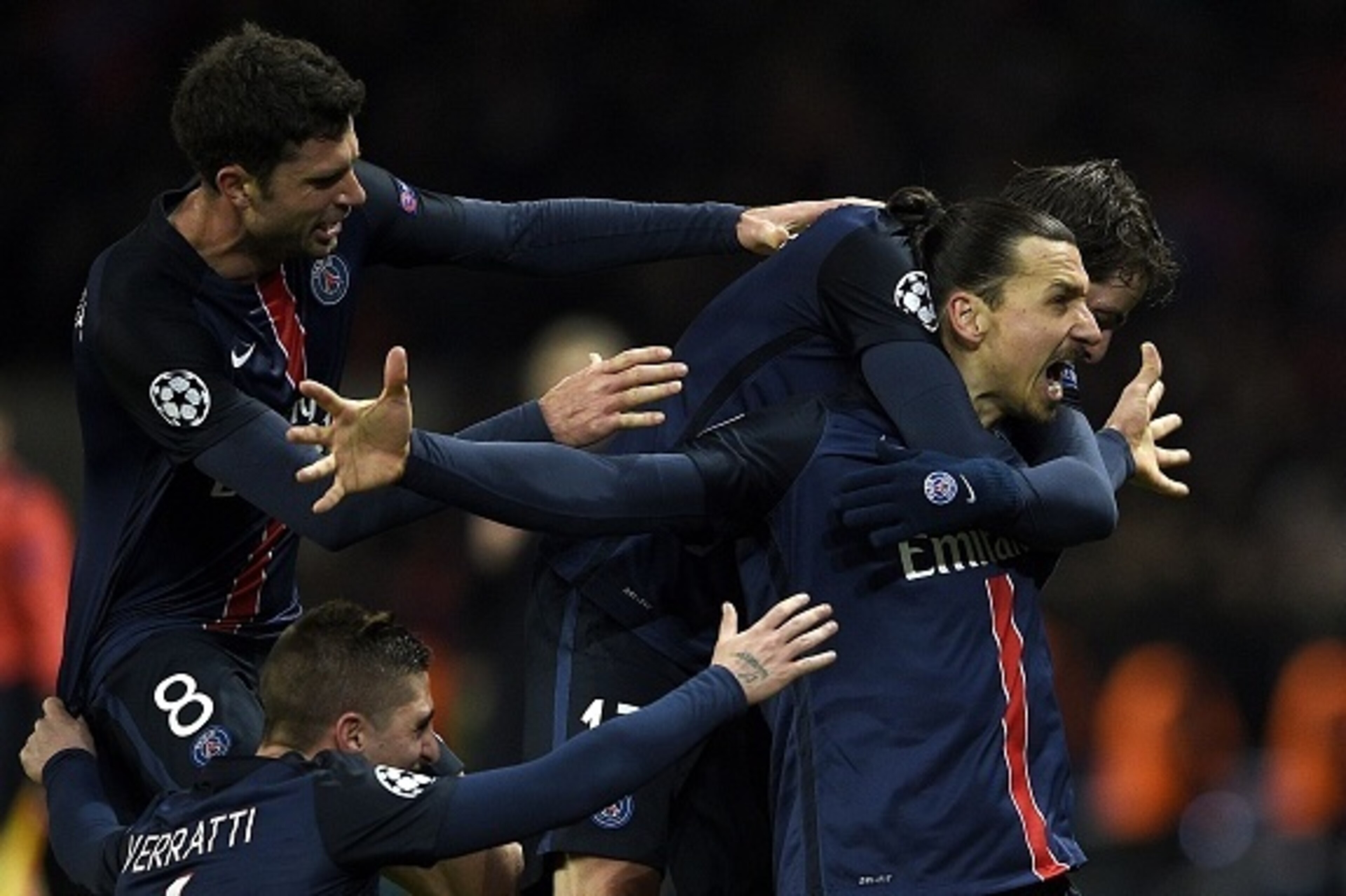 Paris Saint-Germain's Swedish forward Zlatan Ibrahimovic (R) celebrates with teammates after scoring a goal during the Champions League round of 16 first leg football match between Paris Saint-Germain (PSG) and Chelsea FC on February 16, 2016, at the Par Paris Saint-Germain's Swedish forward Zlatan Ibrahimovic (R) celebrates with teammates after scoring a goal during the Champions League round of 16 first leg football match between Paris Saint-Germain (PSG) and Chelsea FC on February 16, 2016, at the Par
