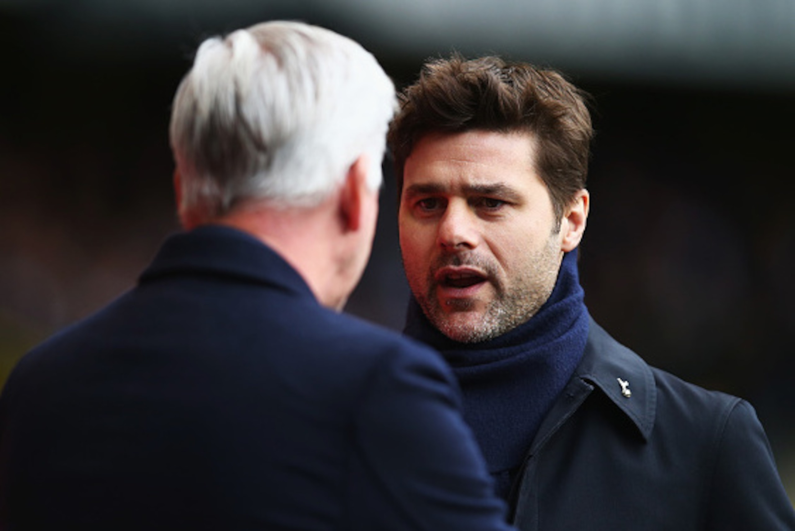 LONDON, ENGLAND - FEBRUARY 21: Mauricio Pochettino, Manager of Tottenham Hotspur talks with Alan Pardew, Manager of Crystal Palace during the Emirates FA Cup Fifth Round match between Tottenham Hotspur and Crystal Palace at White Hart Lane on February 21,