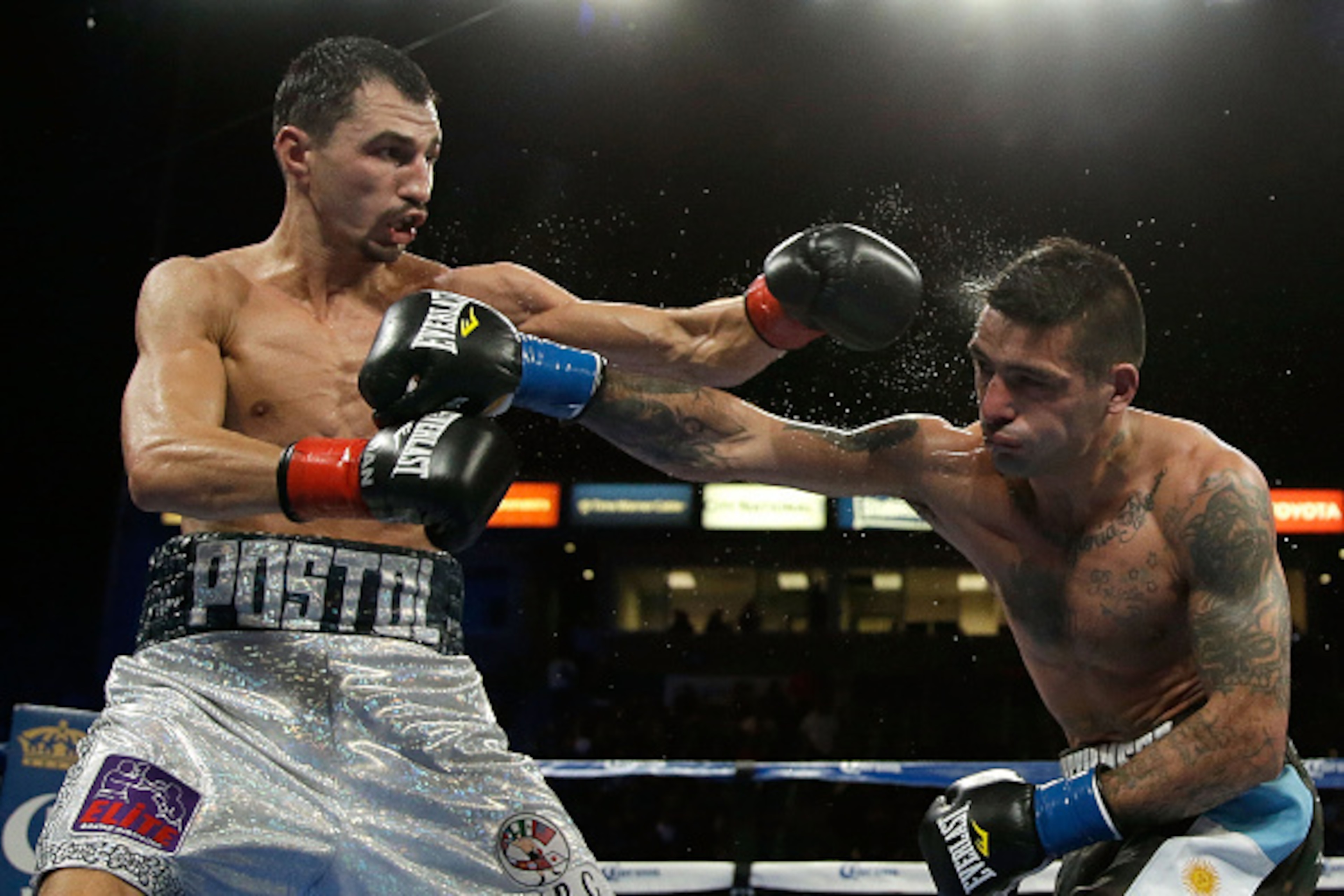 CARSON, CA - OCTOBER 03:  Viktor Postol (L) of the Ukraine throws a left hand at Lucas Matthysse of Argentina at StubHub Center on October 3, 2015 in Carson, California.  (Photo by Jeff Gross/Getty Images)