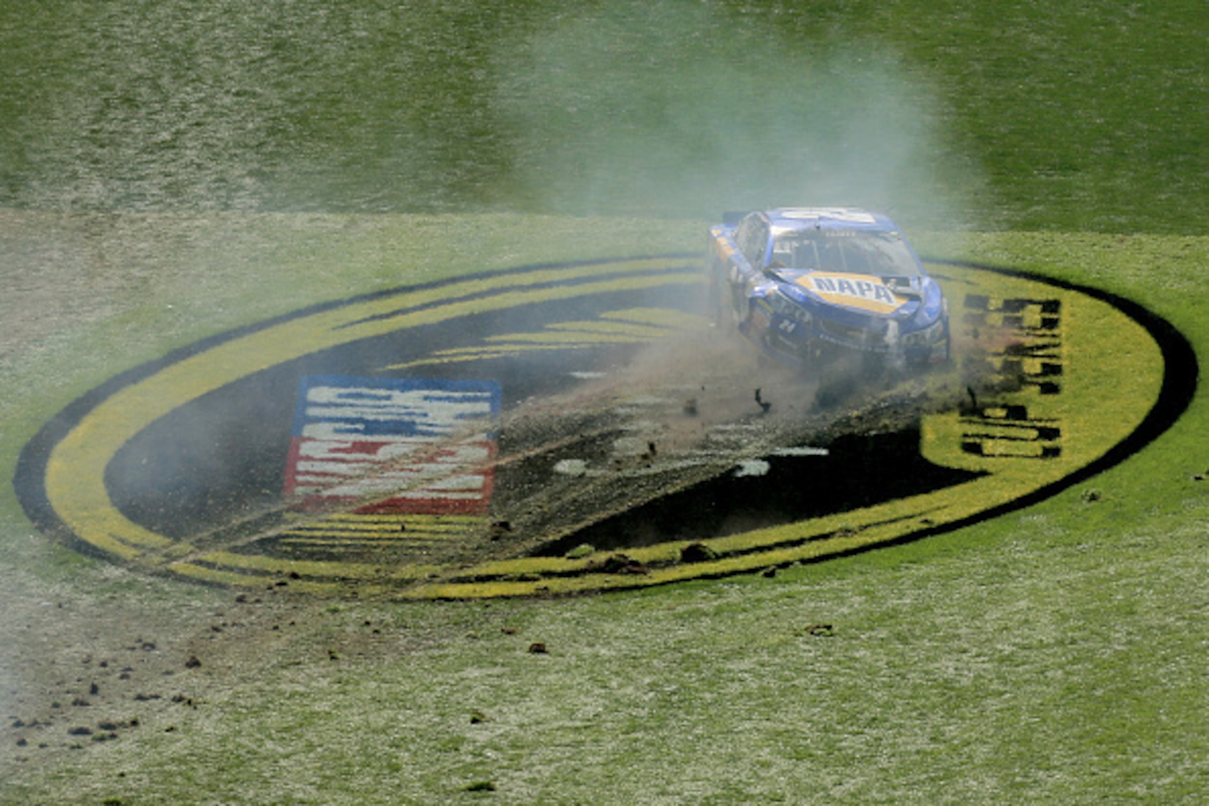 DAYTONA BEACH, FL - FEBRUARY 21:  Chase Elliott, driver of the #24 NAPA Auto Parts Chevrolet, has an on track incident during the NASCAR Sprint Cup Series DAYTONA 500 at Daytona International Speedway on February 21, 2016 in Daytona Beach, Florida.  (Phot