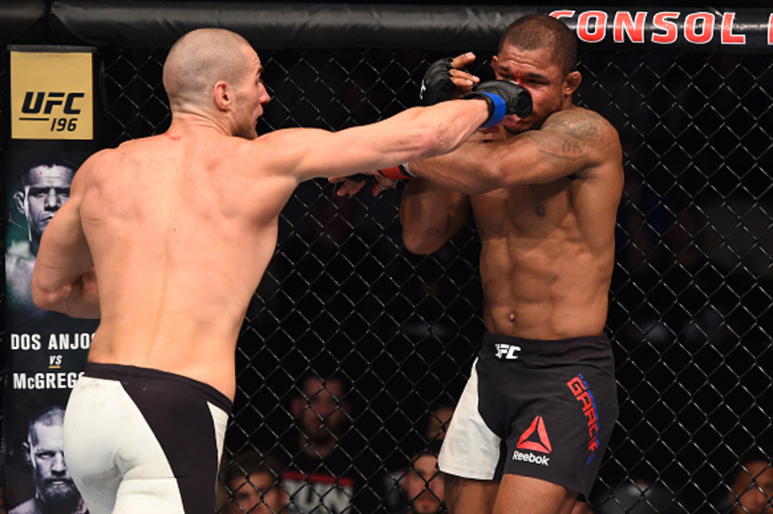 PITTSBURGH, PA - FEBRUARY 21:  (L-R) Sean Strickland punches Alex Garcia in their welterweight bout during the UFC Fight Night event at Consol Energy Center on February 21, 2016 in Pittsburgh, Pennsylvania. (Photo by Jeff Bottari/Zuffa LLC/Zuffa LLC via G