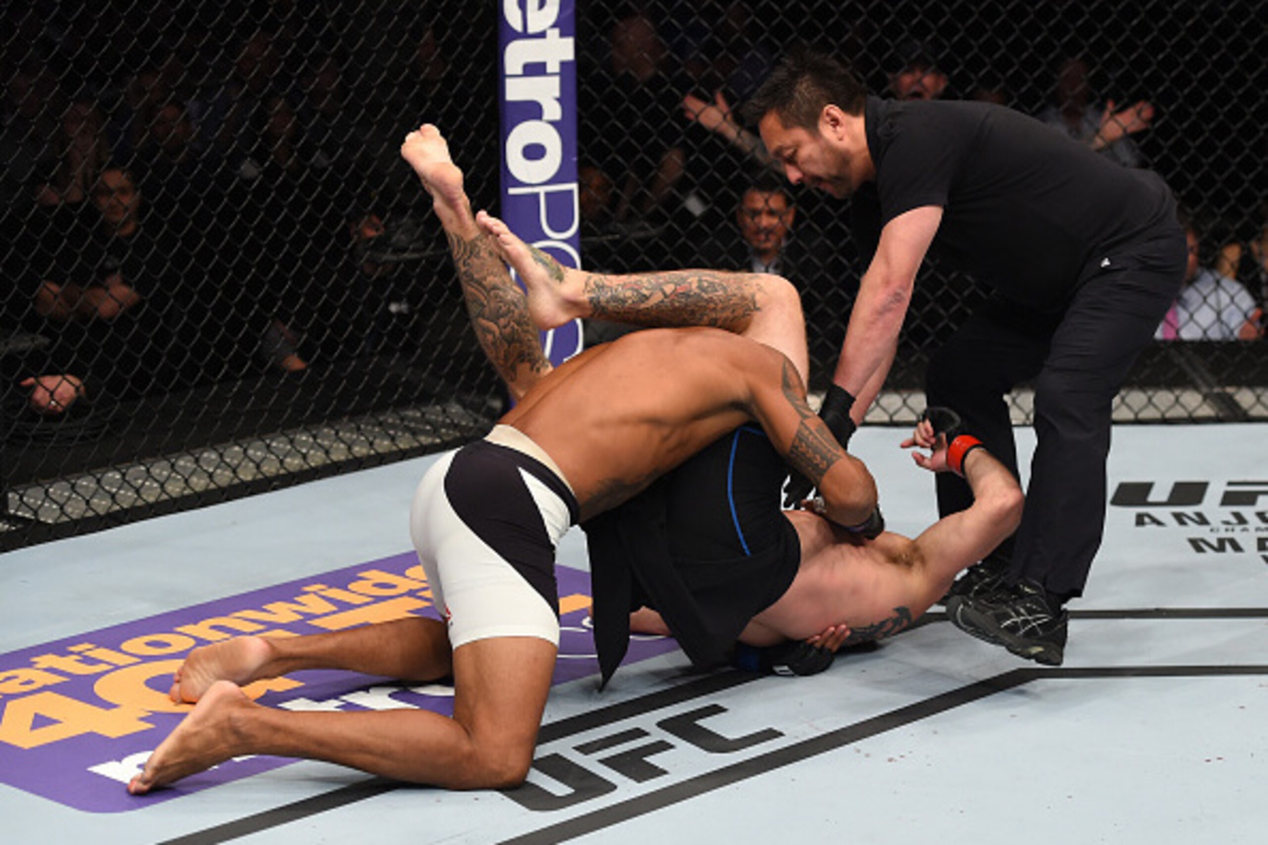PITTSBURGH, PA - FEBRUARY 21:  Donald Cerrone submits Alex Oliveira in their welterweight bout during the UFC Fight Night event at Consol Energy Center on February 21, 2016 in Pittsburgh, Pennsylvania. (Photo by Jeff Bottari/Zuffa LLC/Zuffa LLC via Getty 