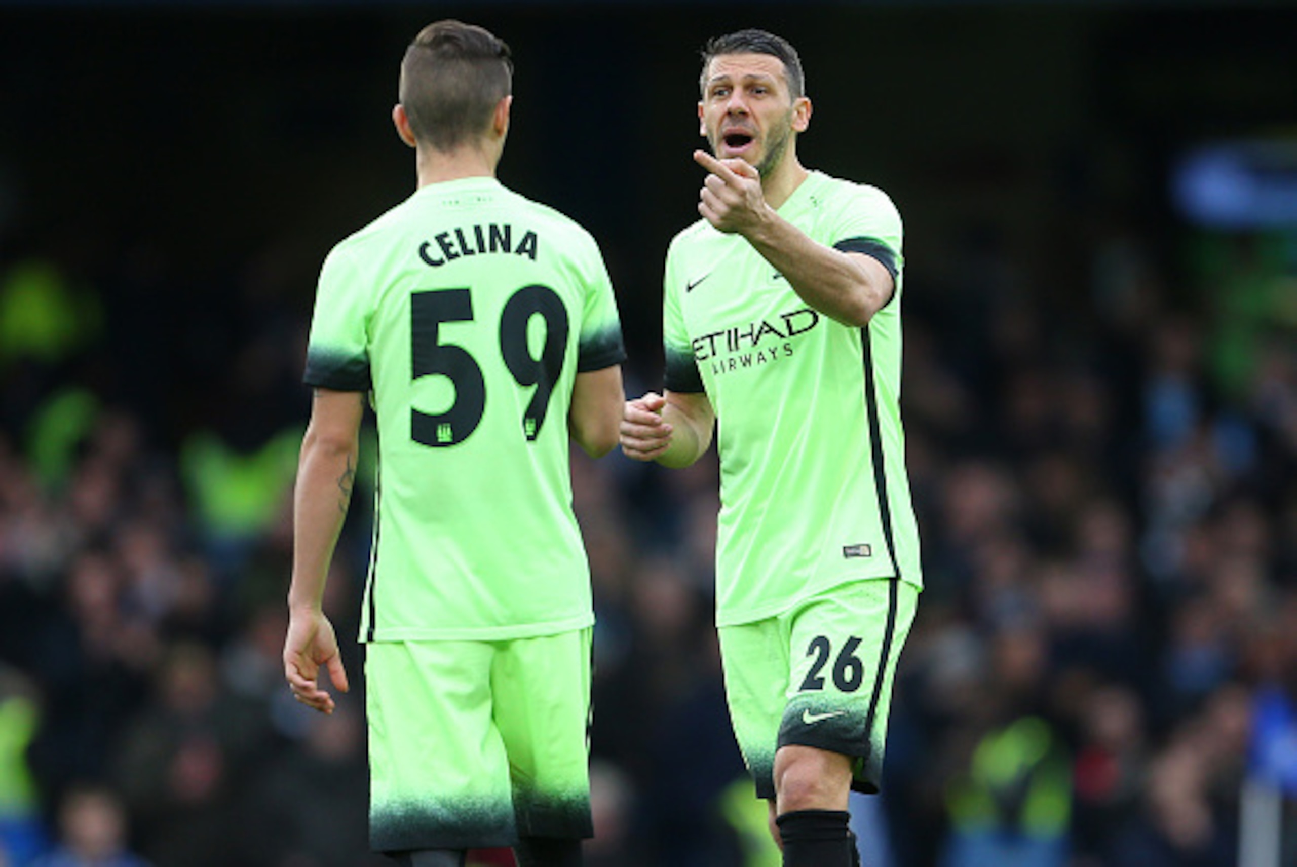 LONDON, ENGLAND - FEBRUARY 21 :  Martin Demichelis of Manchester City talks to Bersant Celina of Manchester City during the Emirates FA Cup match between Chelsea and Manchester City at Stamford Bridge on February 21, 2016 in London, England.  (Photo by Ca