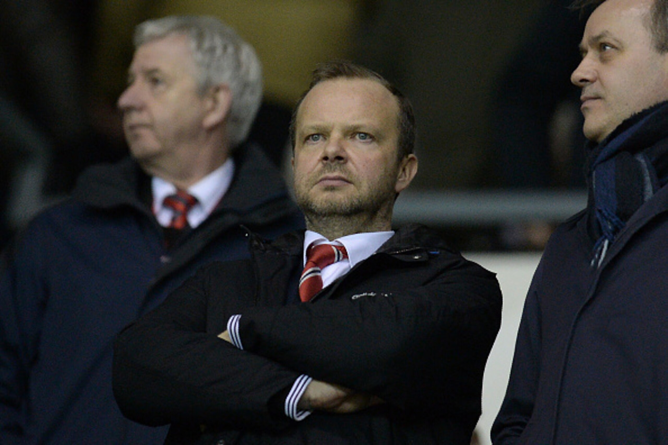 Manchester United's executive vice-chairman Ed Woodward (C) stands in the crowd ahead of the FA cup fourth round football match between Derby County and Manchester United at Pride Park stadium in Derby on January 29, 2016. / AFP / OLI SCARFF / RESTRICTED 