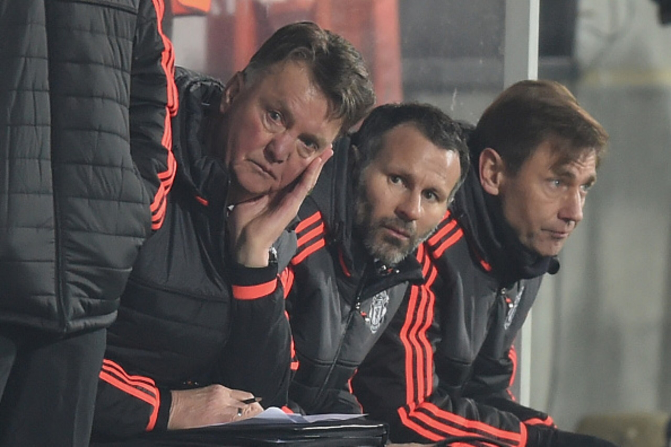 HERNING, DENMARK - FEBRUARY 18:  Louis van Gaal (L) Manager of Manchester United and Ryan Giggs (C) assistant manager look on during the UEFA Europa League round of 32 first leg match between FC Midtjylland and Manchester United at Herning MCH Multi Arena