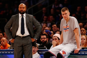 NEW YORK, NY - DECEMBER 16:  Derek Fisher of the New York Knicks and Kristaps Porzingis #6 look on from the bench against the Minnesota Timberwolves at Madison Square Garden on December 16, 2015 in New York City. NOTE TO USER: User expressly acknowledges 