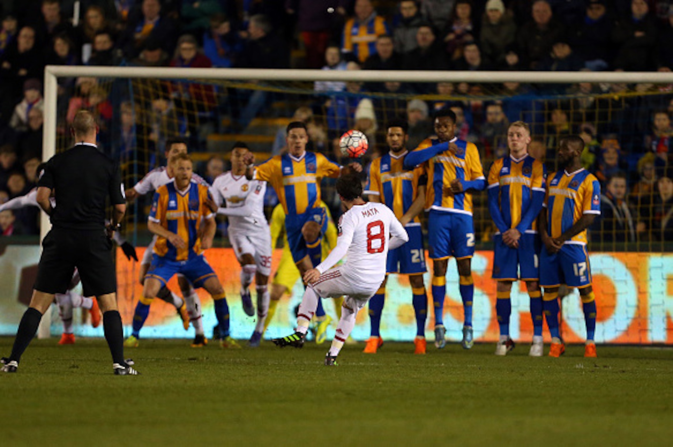 SHREWSBURY, ENGLAND - FEBRUARY 22 :  Juan Mata of Manchester United scores to make it 0-2 during the Emirates FA Cup match between Shrewsbury Town and Manchester United at New Meadow on February 22, 2016 in Shrewsbury, England.  (Photo by Catherine Ivill 