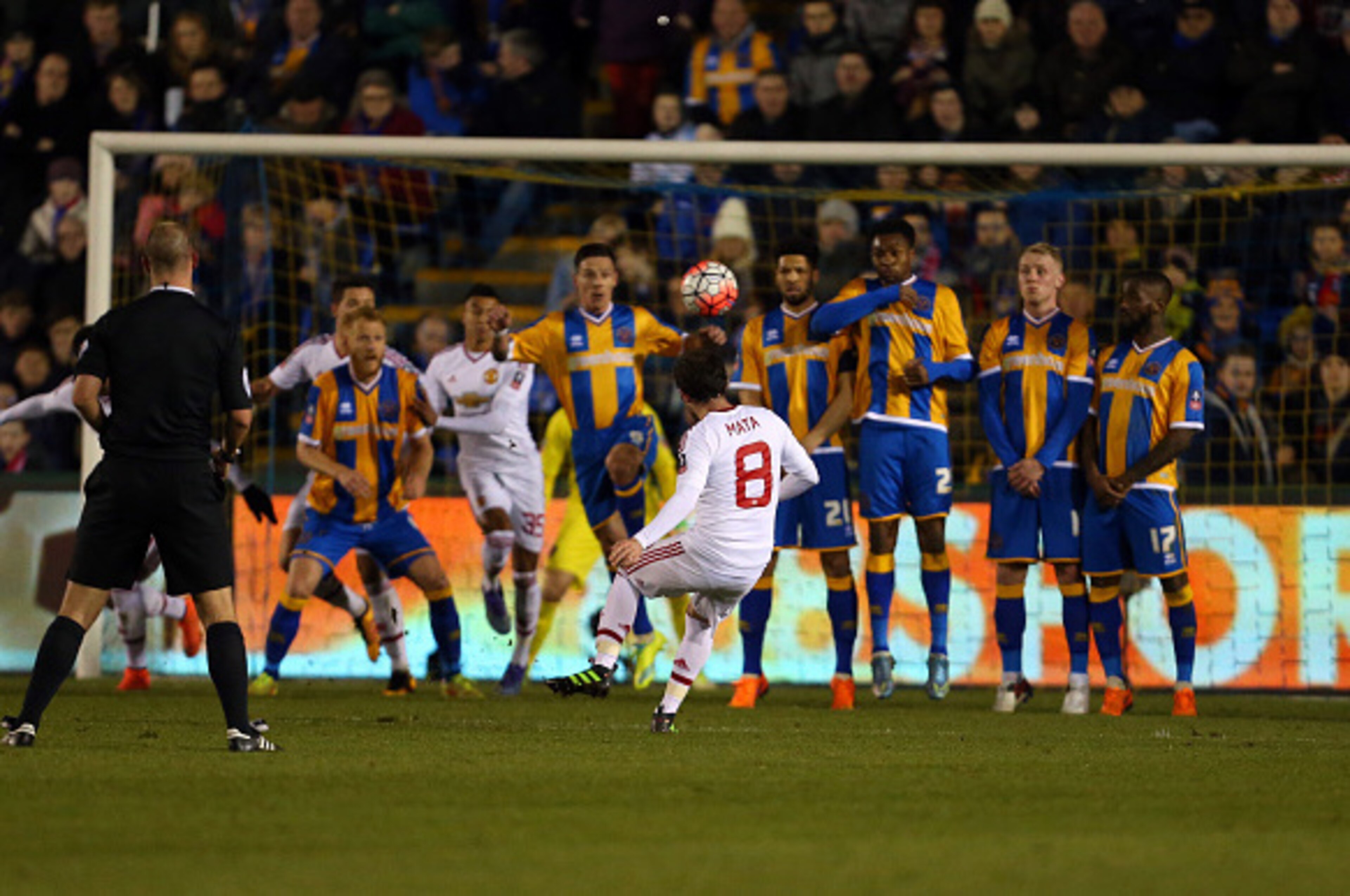 SHREWSBURY, ENGLAND - FEBRUARY 22 :  Juan Mata of Manchester United scores to make it 0-2 during the Emirates FA Cup match between Shrewsbury Town and Manchester United at New Meadow on February 22, 2016 in Shrewsbury, England.  (Photo by Catherine Ivill 