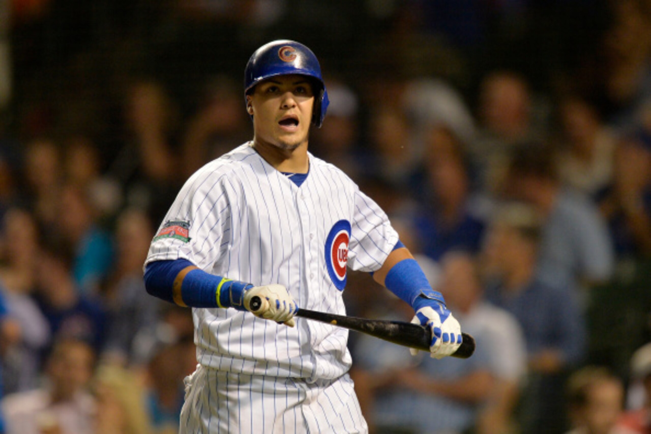 CHICAGO, IL - AUGUST 21:  Javier Baez #9 of the Chicago Cubs walks back to the dugout after striking out during the fifth inning against the San Francisco Giants at Wrigley Field on August 21, 2014 in Chicago, Illinois.  (Photo by Brian Kersey/Getty Image