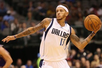 DALLAS, TX - OCTOBER 17:  Delonte West #13 of the Dallas Mavericks passes the ball against the Phoenix Suns during a preseason game at American Airlines Center on October 17, 2012 in Dallas, Texas. NOTE TO USER: User expressly acknowledges and agrees that