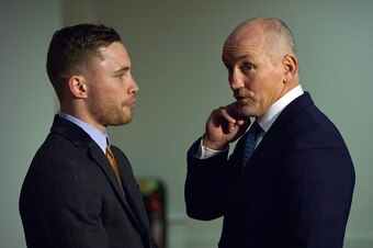 BELFAST, NORTHERN IRELAND - DECEMBER 18:  Carl Frampton (L) and his manager Barry McGuigan (R) in conversation before the press conference to announce the IBF World Super Bantamweight Championship fight between Carl Frampton and Chris Avalos at The Europa
