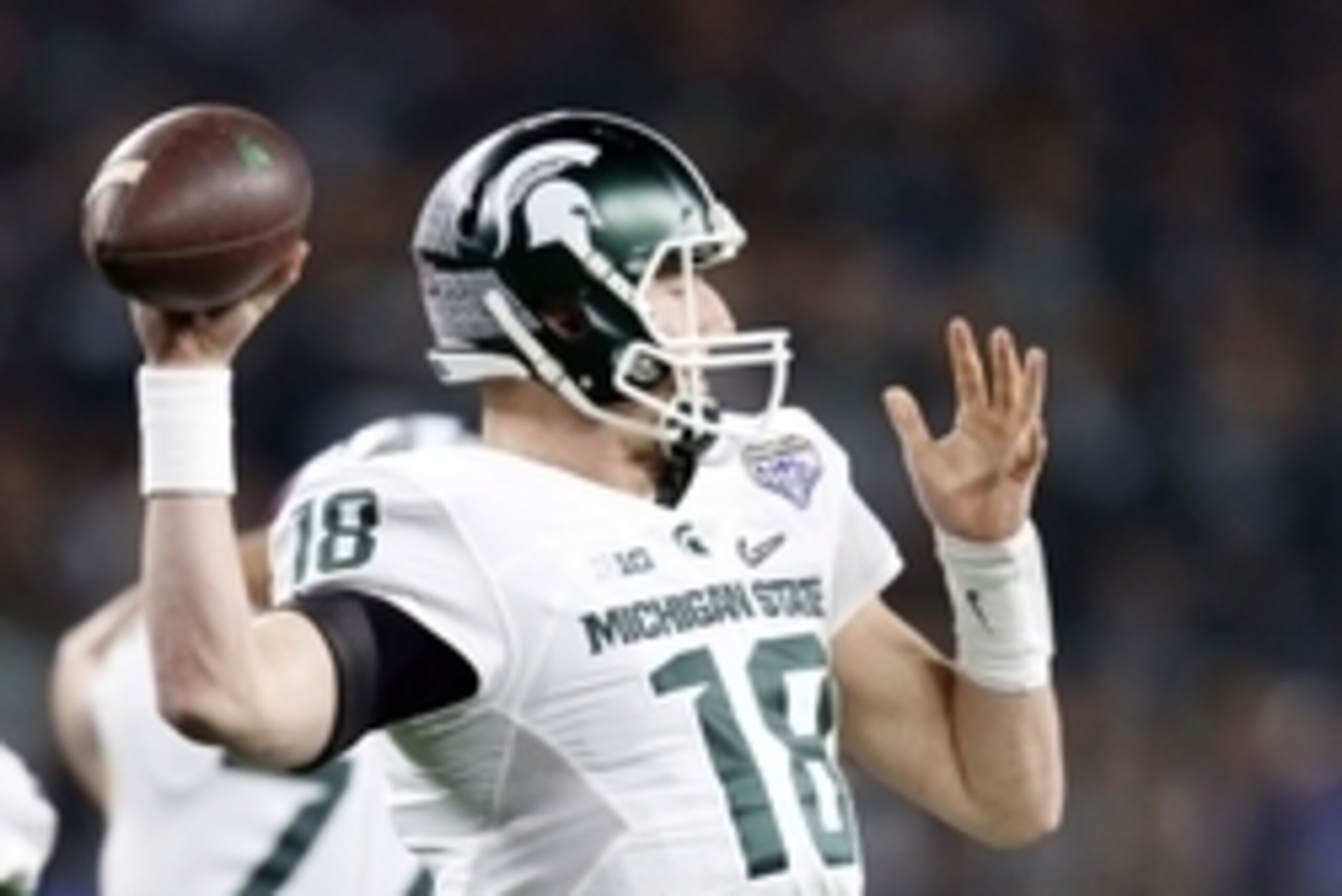 Dec 31, 2015; Arlington, TX, USA; Michigan State Spartans quarterback Connor Cook (18) throws a pass against the Alabama Crimson Tide in the first half in the 2015 CFP semifinal at the Cotton Bowl at AT&T Stadium. Mandatory Credit: Matthew Emmons-USA TODA