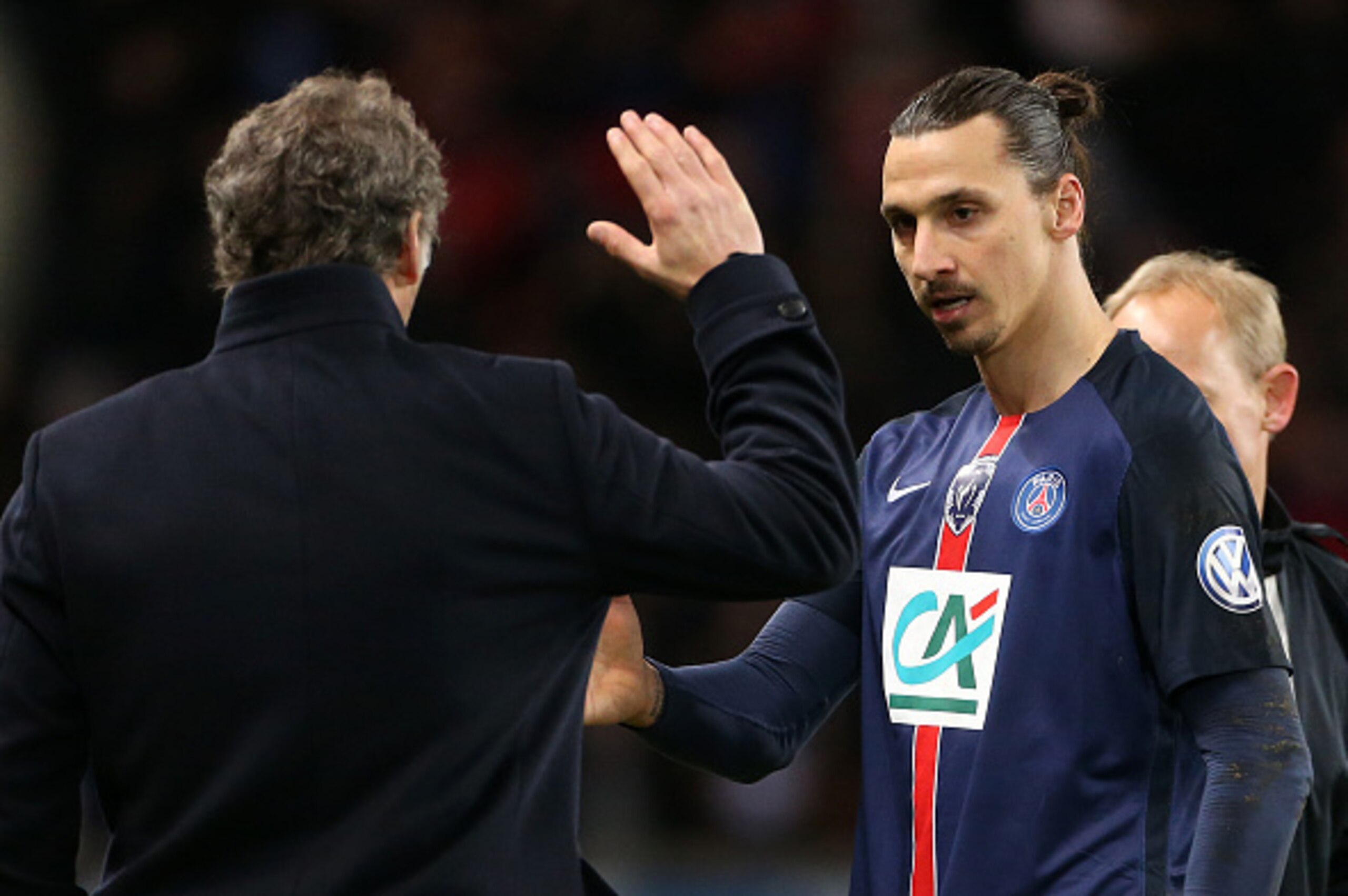 PARIS - FEBRUARY 10: Zlatan Ibrahimovic of PSG greets coach of PSG Laurent Blanc after being replaced during the French Cup (Coupe de France) match between Paris Saint-Germain (PSG) and Olympique Lyonnais (OL) at Parc des Princes stadium on February 10, 2 PARIS - FEBRUARY 10: Zlatan Ibrahimovic of PSG greets coach of PSG Laurent Blanc after being replaced during the French Cup (Coupe de France) match between Paris Saint-Germain (PSG) and Olympique Lyonnais (OL) at Parc des Princes stadium on February 10, 2