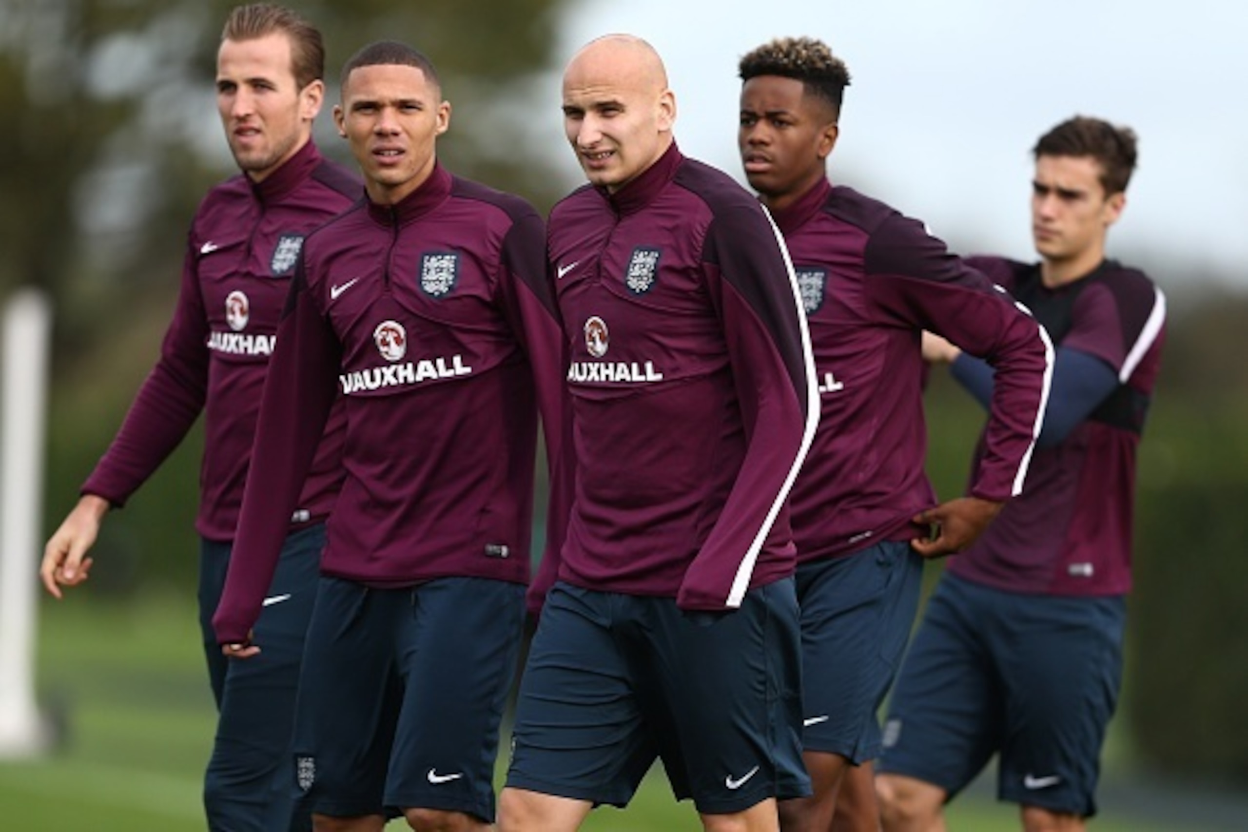 England's striker Harry Kane (L), defender Kieran Gibbs (2nd L), midfielder Jonjo Shelvey (C) and Tottenham's Shayon Harrison and Harry Winks (R) take part in an England team training session at Tottenham Hotspur Training Centre in London on November 16, 