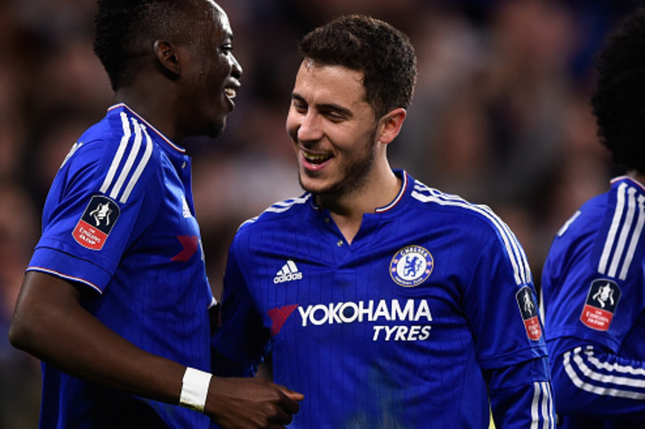 LONDON, ENGLAND - FEBRUARY 21:  Bertrand Traore of Chelsea is congratulated by teammate Eden Hazard (R) after scoring his team's fifth goal during The Emirates FA Cup fifth round match between Chelsea and Manchester City at Stamford Bridge on February 21,