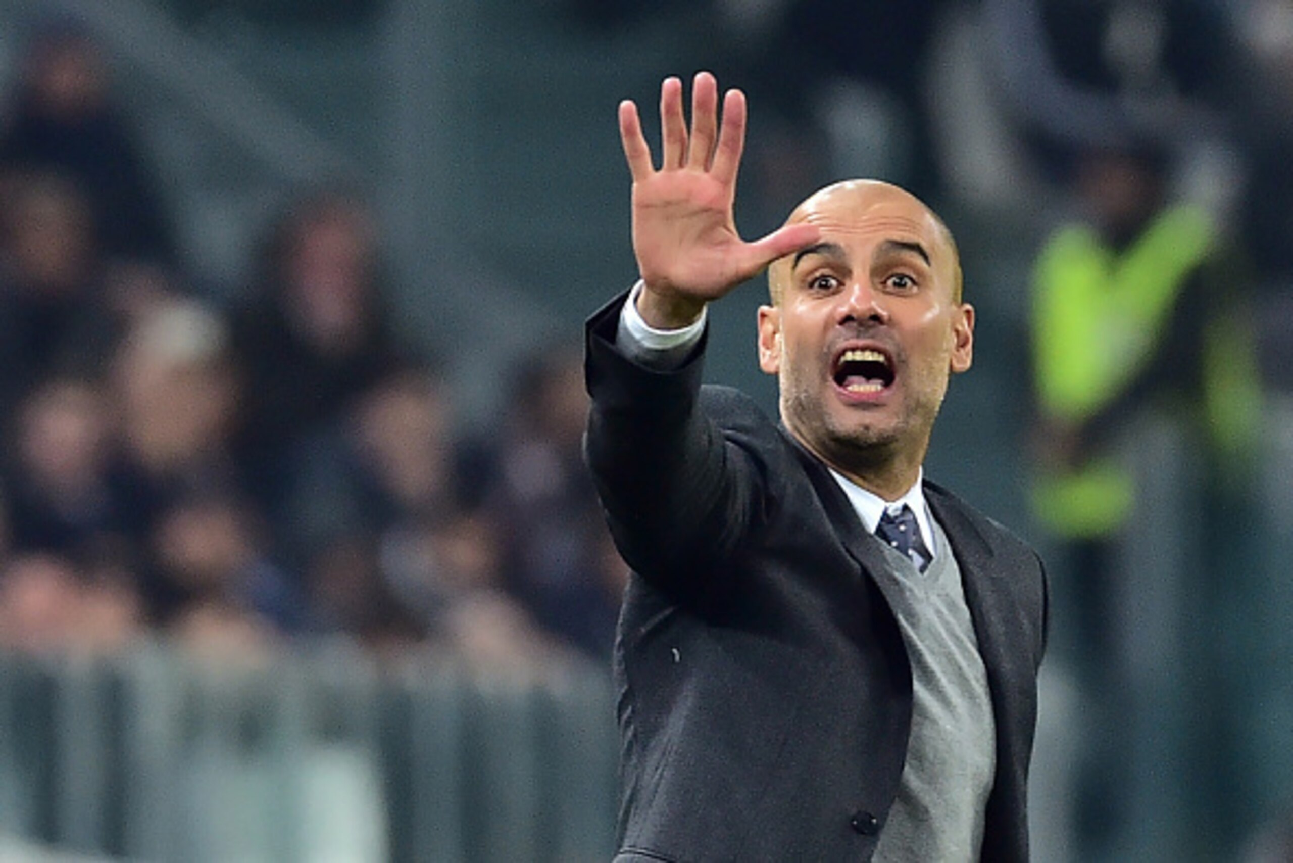 Bayern Munich's Spanish coach Pep Guardiola reacts during the UEFA Champions League round of 16 first leg football match between Juventus and Bayern Munich at the Juventus Stadium in Turin on February 23, 2016.   AFP PHOTO / GIUSEPPE CACACE / AFP / GIUSEP