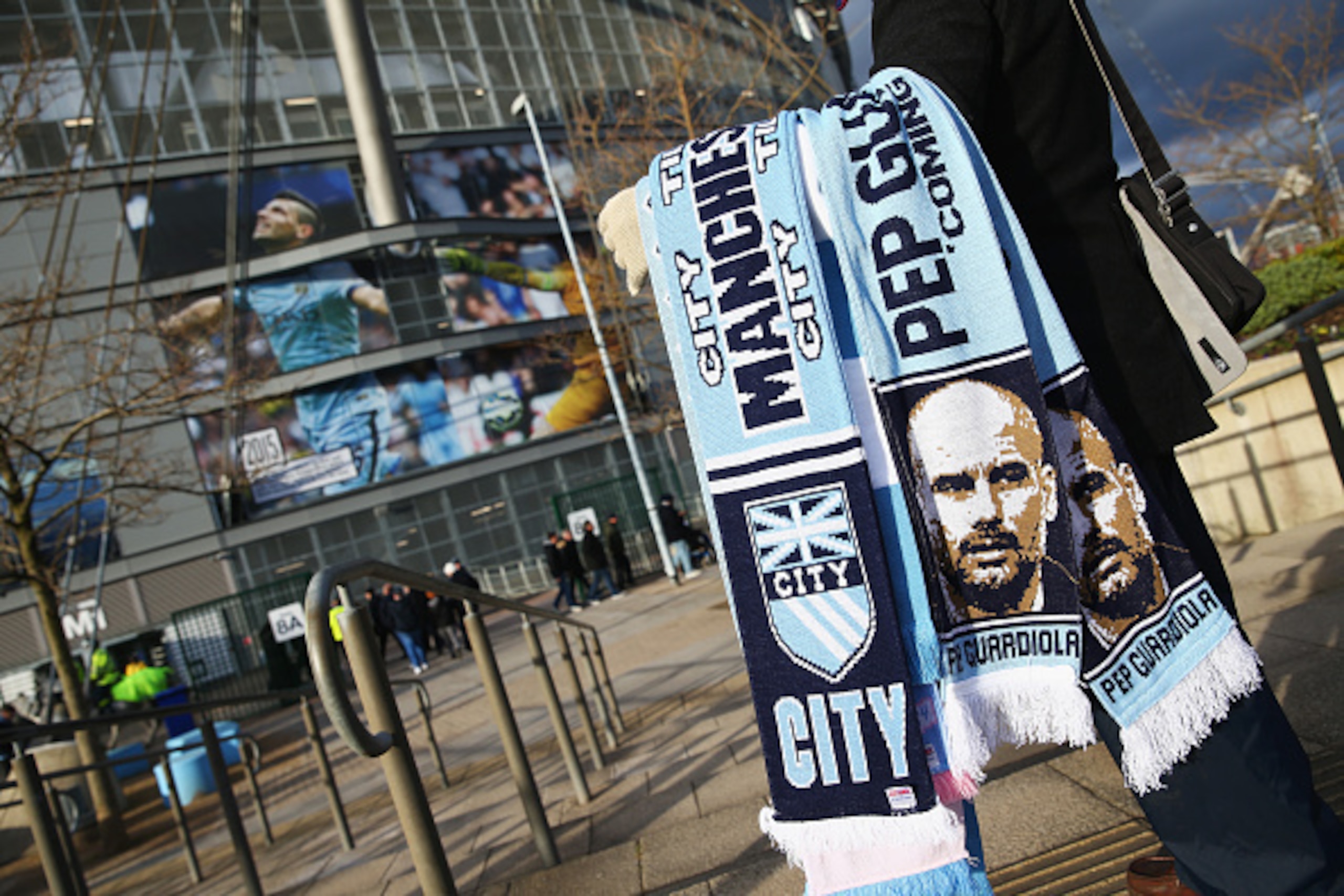 MANCHESTER, ENGLAND - FEBRUARY 14: A Pep Guardiola scarf is carried outside the ground prior to the Barclays Premier League match between Manchester City and Tottenham Hotspur at Etihad Stadium on February 14, 2016 in Manchester, England.  (Photo by Clive