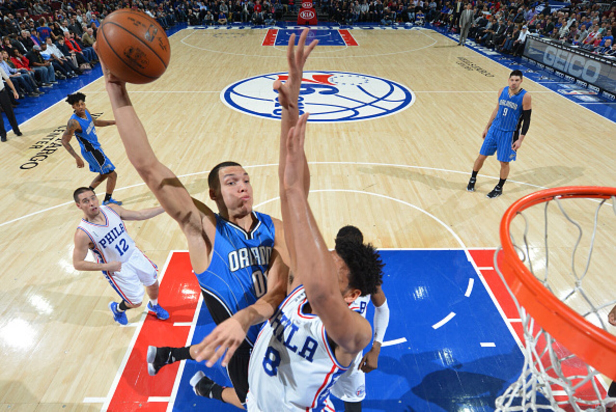 PHILADELPHIA,PA - FEBRUARY 23: Aaron Gordon #00 of the Orlando Magic goes up for the dunk against the Philadelphia 76ers at Wells Fargo Center on February 23, 2016 in Philadelphia, Pennsylvania NOTE TO USER: User expressly acknowledges and agrees that, b PHILADELPHIA,PA - FEBRUARY 23: Aaron Gordon #00 of the Orlando Magic goes up for the dunk against the Philadelphia 76ers at Wells Fargo Center on February 23, 2016 in Philadelphia, Pennsylvania NOTE TO USER: User expressly acknowledges and agrees that, b