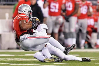COLUMBUS, OH - NOVEMBER 7:  Braxton Miller #1 of the Ohio State Buckeyes is brought down by Briean Boddy-Calhoun #29 of the Minnesota Golden Gophers in the fourth quarter after catching a 45-yard pass at Ohio Stadium on November 7, 2015 in Columbus, Ohio.