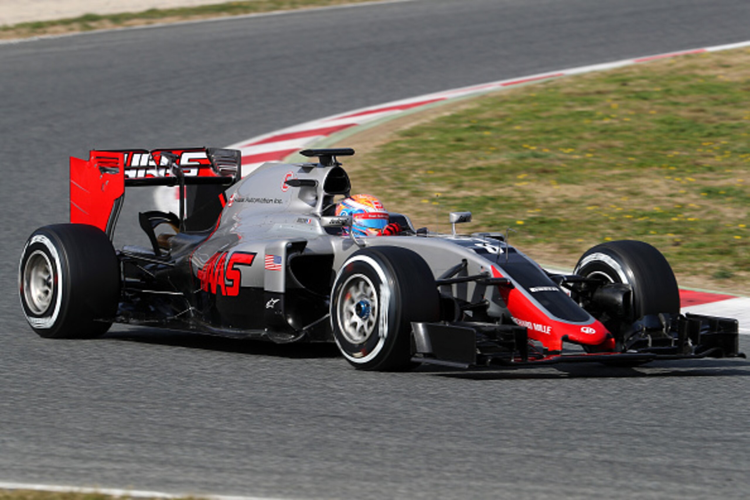 MONTMELO, SPAIN - FEBRUARY 24:  Romain Grosjean of France and Haas F1 drives during day three of F1 winter testing at Circuit de Catalunya on February 24, 2016 in Montmelo, Spain.  (Photo by Mark Thompson/Getty Images)