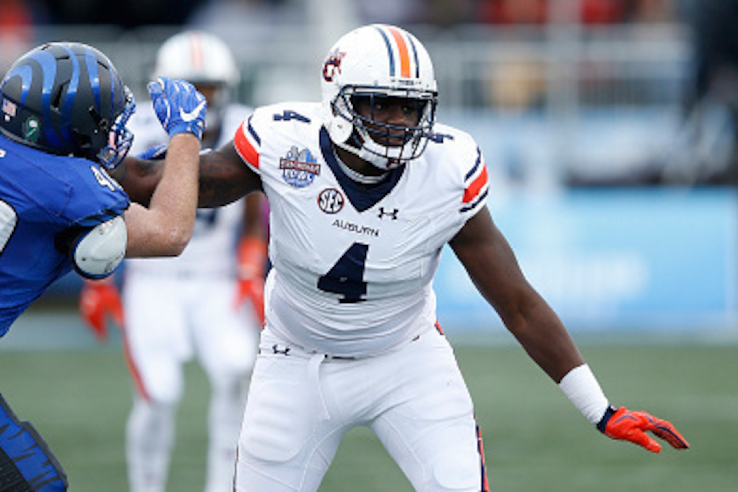 BIRMINGHAM, AL - DECEMBER 30: Jeff Holland #4 of the Auburn Tigers in action against the Memphis Tigers during the Birmingham Bowl at Legion Field on December 30, 2015 in Birmingham, Alabama. Auburn defeated Memphis 31-10. (Photo by Joe Robbins/Getty Imag
