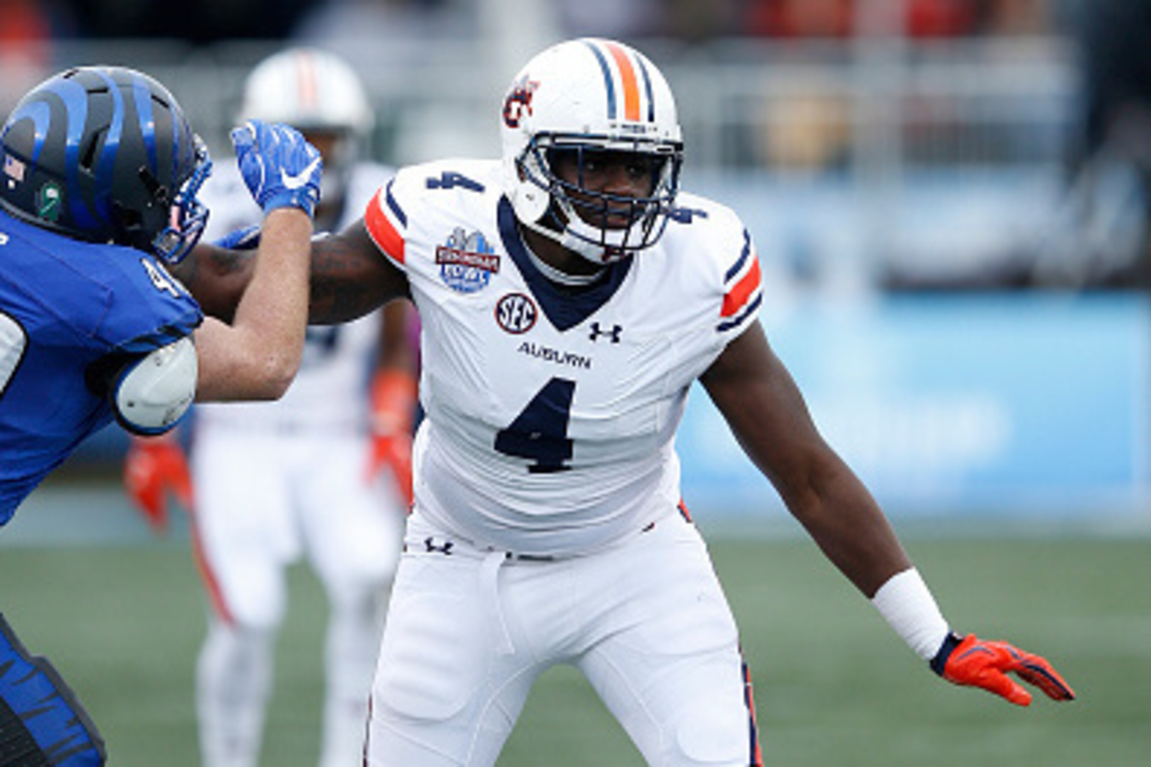 BIRMINGHAM, AL - DECEMBER 30: Jeff Holland #4 of the Auburn Tigers in action against the Memphis Tigers during the Birmingham Bowl at Legion Field on December 30, 2015 in Birmingham, Alabama. Auburn defeated Memphis 31-10. (Photo by Joe Robbins/Getty Imag BIRMINGHAM, AL - DECEMBER 30: Jeff Holland #4 of the Auburn Tigers in action against the Memphis Tigers during the Birmingham Bowl at Legion Field on December 30, 2015 in Birmingham, Alabama. Auburn defeated Memphis 31-10. (Photo by Joe Robbins/Getty Imag
