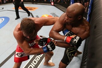 RIO DE JANEIRO, BRAZIL - OCTOBER 13:  (R-L) Anderson Silva punches Stephan Bonnar during their light heavyweight fight at UFC 153 inside HSBC Arena on October 13, 2012 in Rio de Janeiro, Brazil.  (Photo by Josh Hedges/Zuffa LLC/Zuffa LLC via Getty Images)