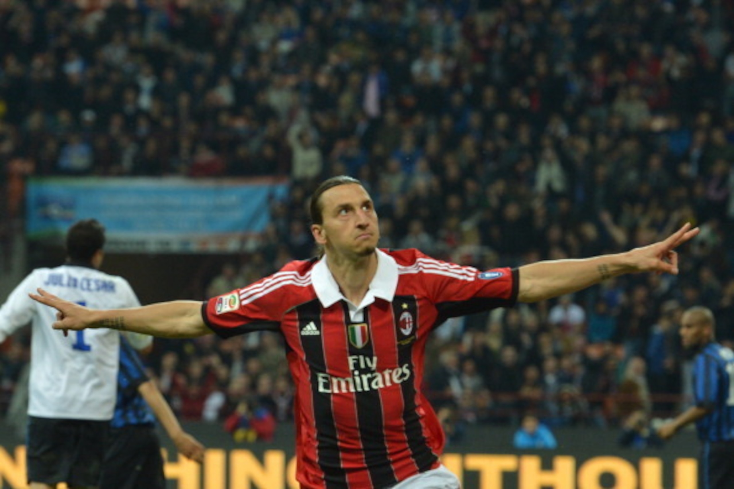 AC Milan's Swedish forward Zlatan Ibrahimovic celebrates after scoring during their Serie A football match between Inter Milan and AC Milan at San Siro Stadium in Milan on May 06, 2012. AFP PHOTO / GIUSEPPE CACACE (Photo credit should read GIUS AC Milan's Swedish forward Zlatan Ibrahimovic celebrates after scoring during their Serie A football match between Inter Milan and AC Milan at San Siro Stadium in Milan on May 06, 2012. AFP PHOTO / GIUSEPPE CACACE (Photo credit should read GIUS