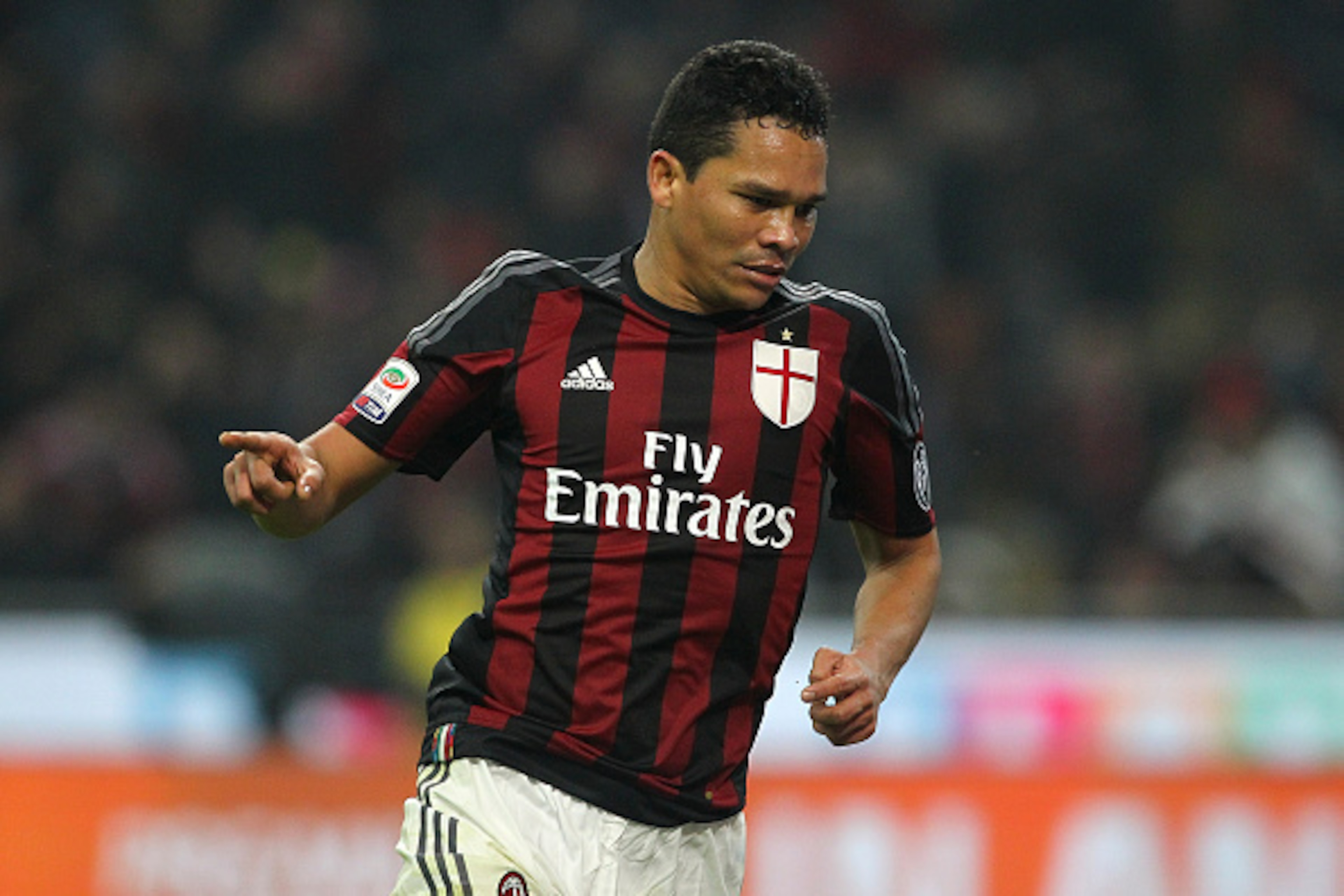 MILAN, ITALY - JANUARY 31:  Carlos Bacca of AC Milan celebrates his goal during the Serie A match between AC Milan and FC Internazionale Milano at Stadio Giuseppe Meazza on January 31, 2016 in Milan, Italy.  (Photo by Marco Luzzani/Getty Images)