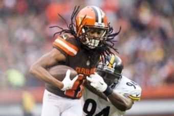Jan 3, 2016, Cleveland, OH, USA; Pittsburgh Steelers inside linebacker Lawrence Timmons (94) tackles Cleveland Browns wide receiver Travis Benjamin (11) during the first quarter at FirstEnergy Stadium. Mandatory Credit: Scott R. Galvin-USA TODAY Sports