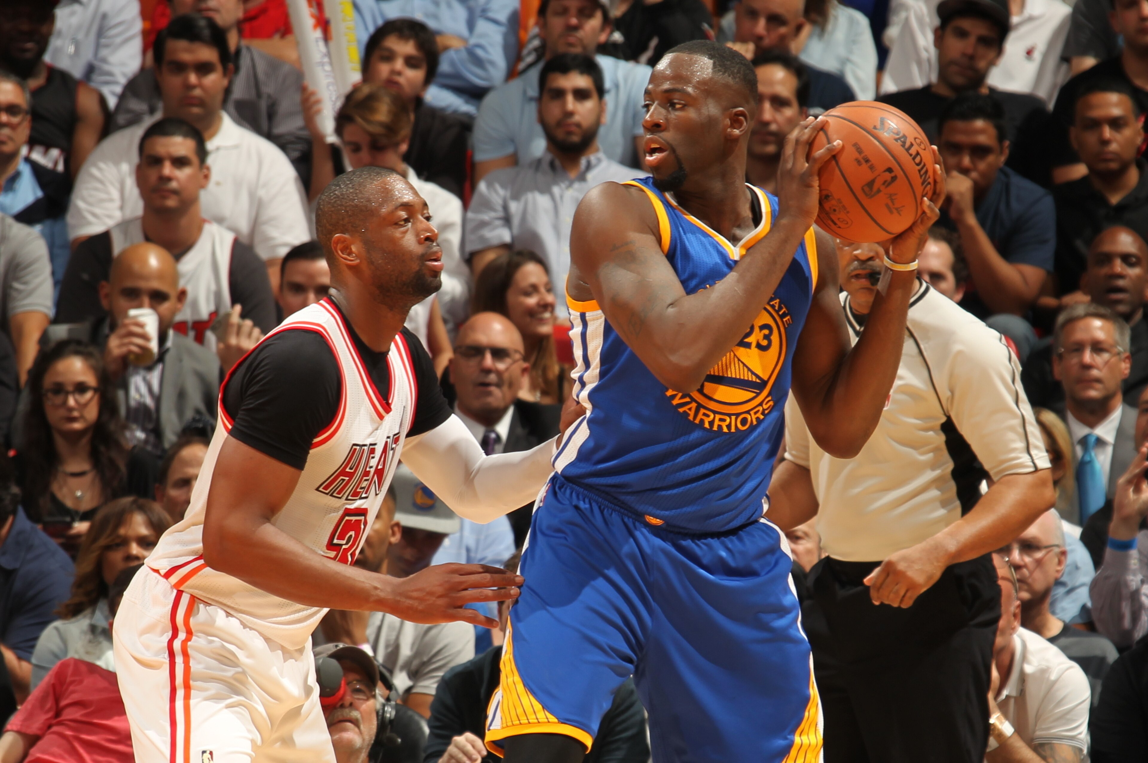 MIAMI, FL - FEBRUARY 24: Draymond Green #23 of the Golden State Warriors handles the ball against Dwyane Wade #3 of the Miami Heat on February 24, 2016 at American Airlines Arena in Miami, Florida. NOTE TO USER: User expressly acknowledges and agrees tha MIAMI, FL - FEBRUARY 24: Draymond Green #23 of the Golden State Warriors handles the ball against Dwyane Wade #3 of the Miami Heat on February 24, 2016 at American Airlines Arena in Miami, Florida. NOTE TO USER: User expressly acknowledges and agrees tha