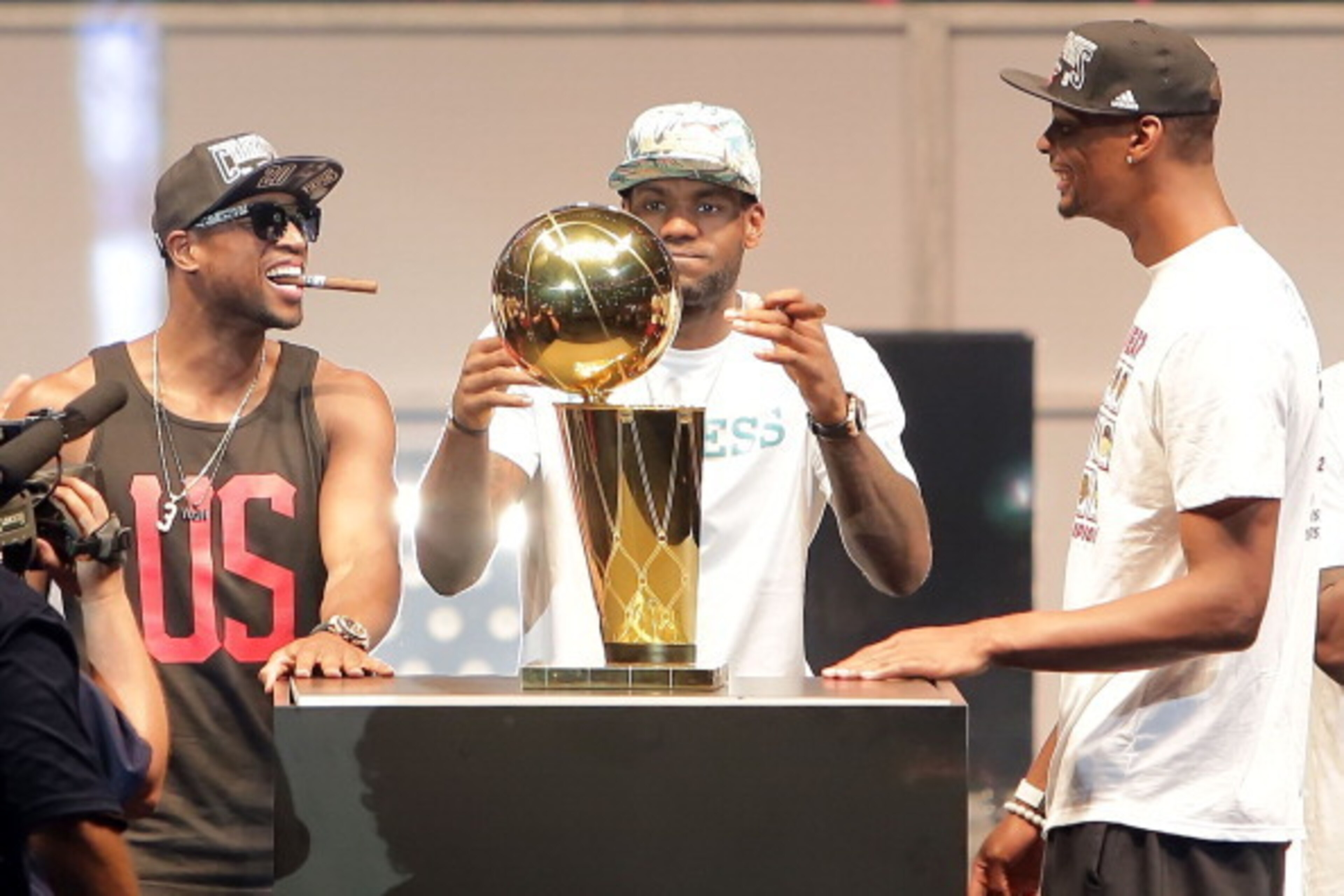 MIAMI, FL - JUNE 24: Dwyane Wade, LeBron James and Chris Bosh of the Miami Heat celebrates the NBA Championship victory rally at the AmericanAirlines Arena on June 24, 2013 in Miami, Florida. The Miami Heat defeated the San Antonio Spurs in the NBA Finals MIAMI, FL - JUNE 24: Dwyane Wade, LeBron James and Chris Bosh of the Miami Heat celebrates the NBA Championship victory rally at the AmericanAirlines Arena on June 24, 2013 in Miami, Florida. The Miami Heat defeated the San Antonio Spurs in the NBA Finals