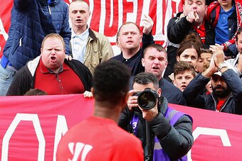 STOKE ON TRENT, ENGLAND - MAY 24:  Liverpool fans react towards Raheem Sterling prior to the Barclays Premier League match between Stoke City and Liverpool at Britannia Stadium on May 24, 2015 in Stoke on Trent, England.  (Photo by Dave Thompson/Getty Ima