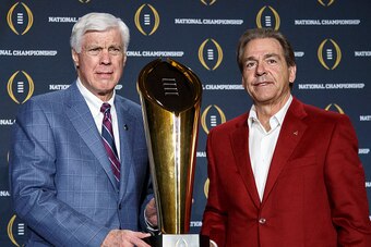 SCOTTSDALE, AZ - JANUARY 12: Athletic Director Bill Battle and Head Coach Nick Saban of the Alabama Crimson Tide pose with the College Football Playoff National Championship Trophy during the MVP Press Conference after winning the College Football Playoff