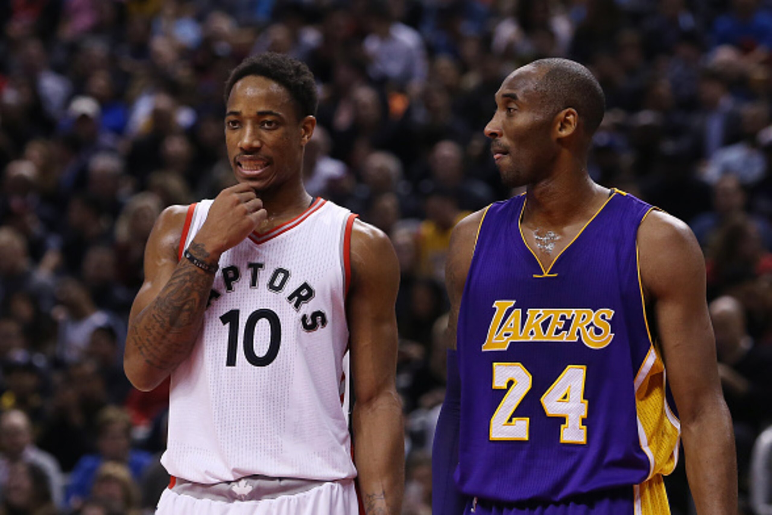 TORONTO, ON - DECEMBER 07:  DeMar DeRozan #10 of the Toronto Raptors and Kobe Bryant #24 of the Los Angeles Lakers lineup for a free throw during an NBA game at the Air Canada Centre on December 07, 2015 in Toronto, Ontario, Canada.  NOTE TO USER: User ex