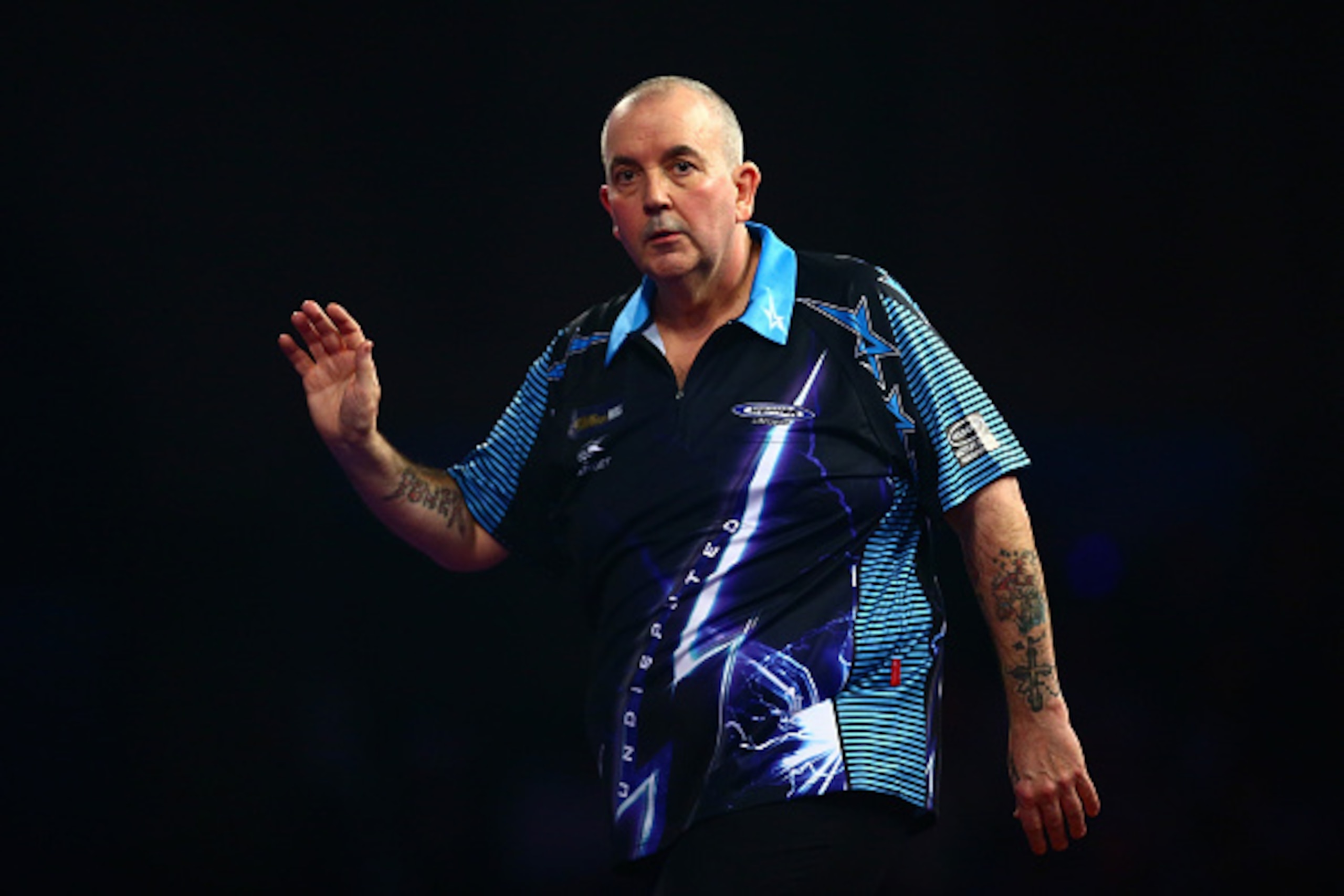 LONDON, ENGLAND - DECEMBER 30:  Phil Taylor of England looks dejected in his third round match against Jelle Klaasen of the Netherlands on Day Twelve of the 2016 William Hill PDC World Darts Championships at Alexandra Palace on December 30, 2015 in London