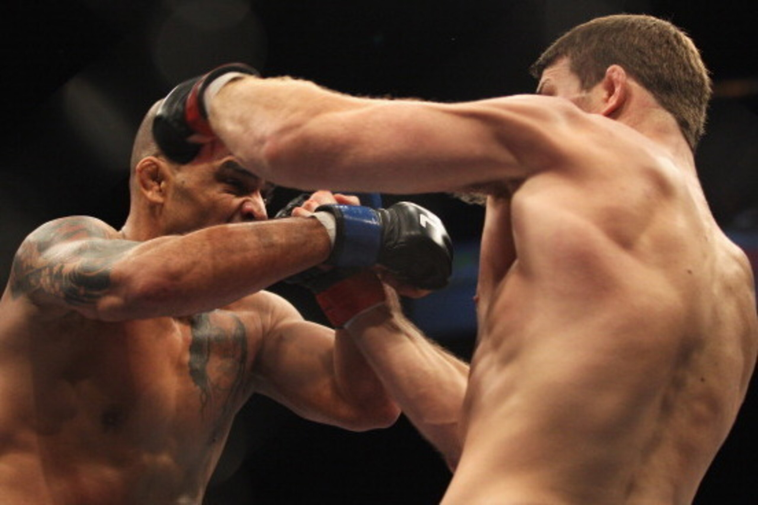 SYDNEY, AUSTRALIA - FEBRUARY 27:   Jorge Rivera of the USA is punched by Michael Bisping of Great Britain in their middleweight bout part of at UFC 127 at Acer Arena on February 27, 2011 in Sydney, Australia.  (Photo by Mark Kolbe/Getty Images)