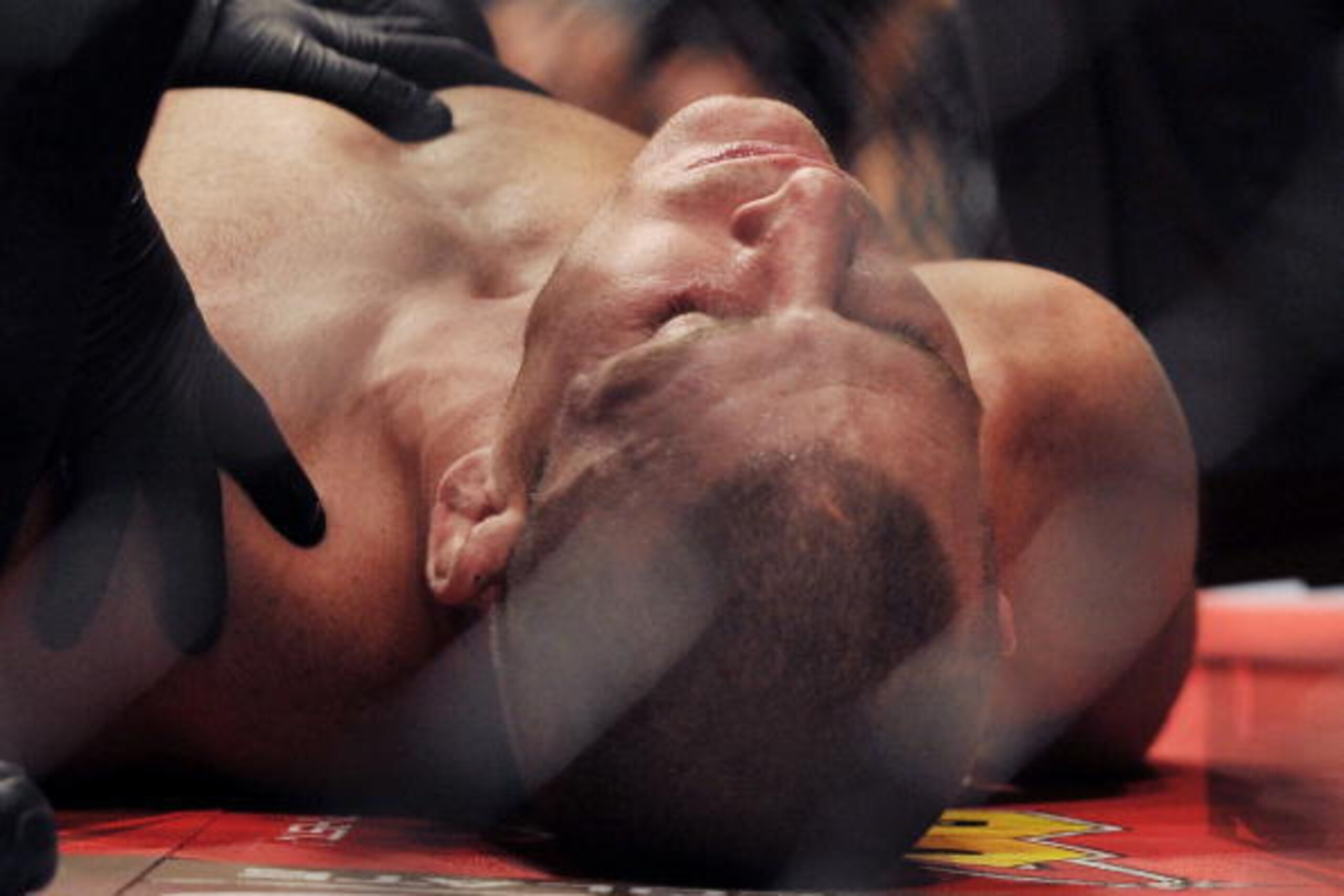 LAS VEGAS - JULY 11:  UFC Middleweight Michael Bisping  knocked out by Dan Henderson during their Middleweight bout at UFC 100 the Mandalay Bay Hotel and Casino on July 11, 2009 in Las Vegas, Nevada.  (Photo by Jon Kopaloff/Getty Images)