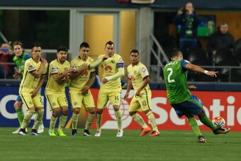 SEATTLE, WA - FEBRUARY 23:  Clint Dempsey of Seattle Sounders kicks and scores a goal to make it 1-0 on a free kick during the CONCACAF Champions League match between Seattle Sounders and Club America at CenturyLink Field on February 23, 2016 in Seattle, 