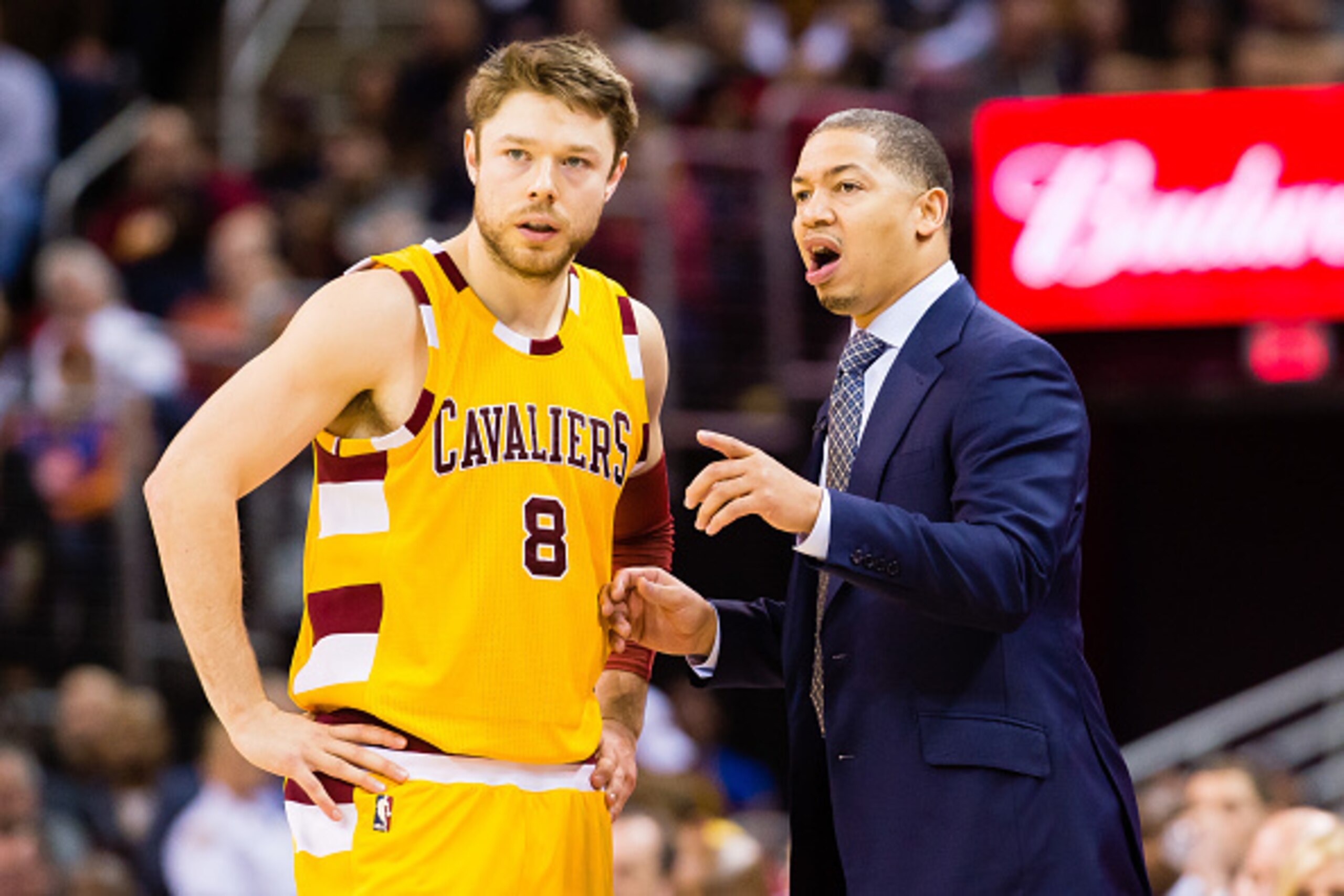 CLEVELAND, OH - JANUARY 30: Matthew Dellavedova #8 talks to head coach Tyronn Lue of the Cleveland Cavaliers during the second half against the San Antonio Spurs at Quicken Loans Arena on January 30, 2016 in Cleveland, Ohio. The Cavaliers defeated the Spu