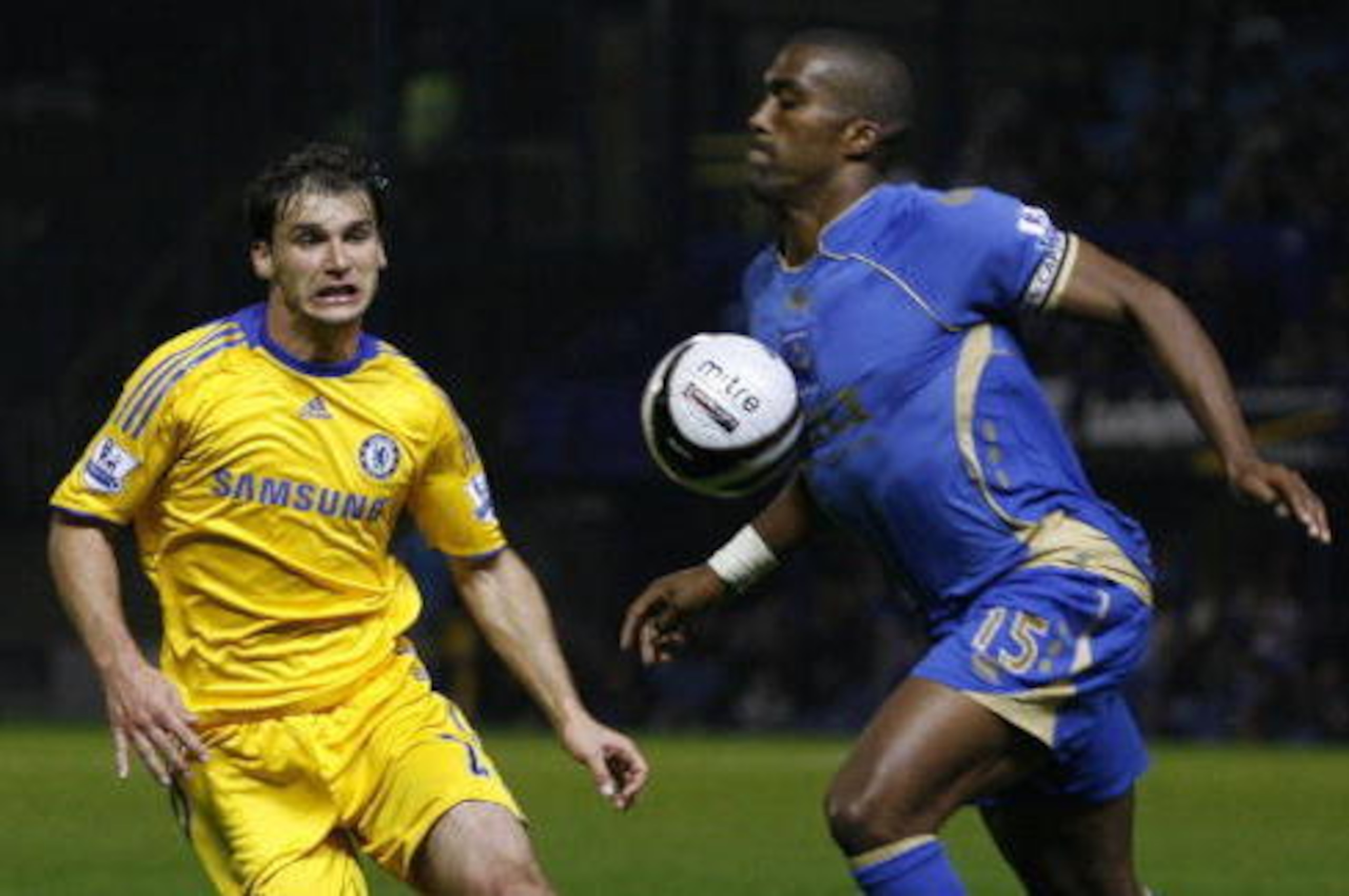 Chelsea's Serbian footballer Branislav Ivanovic (L) challenges Portsmouth's French footballer Sylvain Distin during the Carling Cup Third round game at Fratton Park in Portsmouth, southern England, on September 24, 2008. AFP PHOTO/IAN KINGTON Mobile and Chelsea's Serbian footballer Branislav Ivanovic (L) challenges Portsmouth's French footballer Sylvain Distin during the Carling Cup Third round game at Fratton Park in Portsmouth, southern England, on September 24, 2008. AFP PHOTO/IAN KINGTON Mobile and