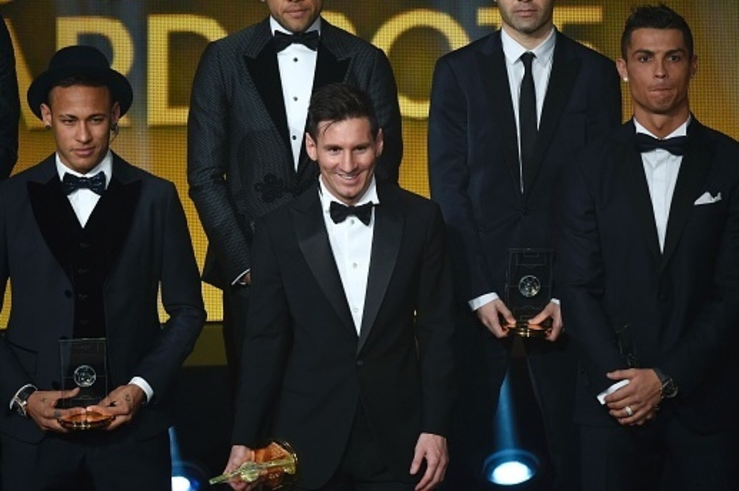 (From L) Brazil and FC Barcelona forward Neymar, Brazil and FC Barcelona defender Dani Alves, Argentina and FC Barcelona forward Lionel Messi, Spain and FC Barcelona midfielder Andres Iniesta and Portugal and Real Madrid forward Cristiano Ronaldo pose on (From L) Brazil and FC Barcelona forward Neymar, Brazil and FC Barcelona defender Dani Alves, Argentina and FC Barcelona forward Lionel Messi, Spain and FC Barcelona midfielder Andres Iniesta and Portugal and Real Madrid forward Cristiano Ronaldo pose on