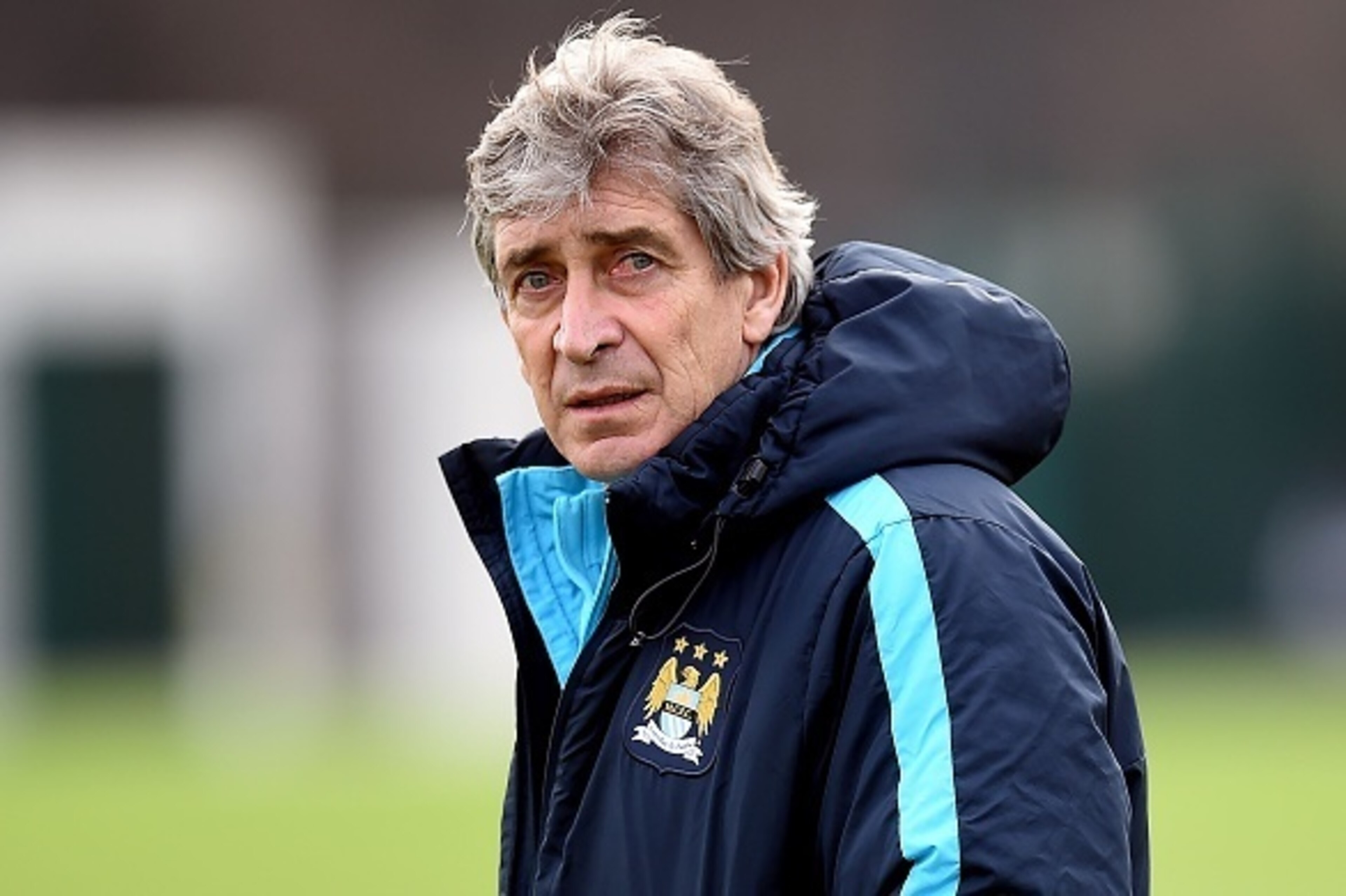Manchester City's Chilean manager Manuel Pellegrini takes part in a training session in Manchester on February 26, 2016, ahead of the English League Cup Final against Liverpool at Wembley Stadium on Sunday February 28, 2016. / AFP / PAUL ELLIS / RESTRICT Manchester City's Chilean manager Manuel Pellegrini takes part in a training session in Manchester on February 26, 2016, ahead of the English League Cup Final against Liverpool at Wembley Stadium on Sunday February 28, 2016. / AFP / PAUL ELLIS / RESTRICT