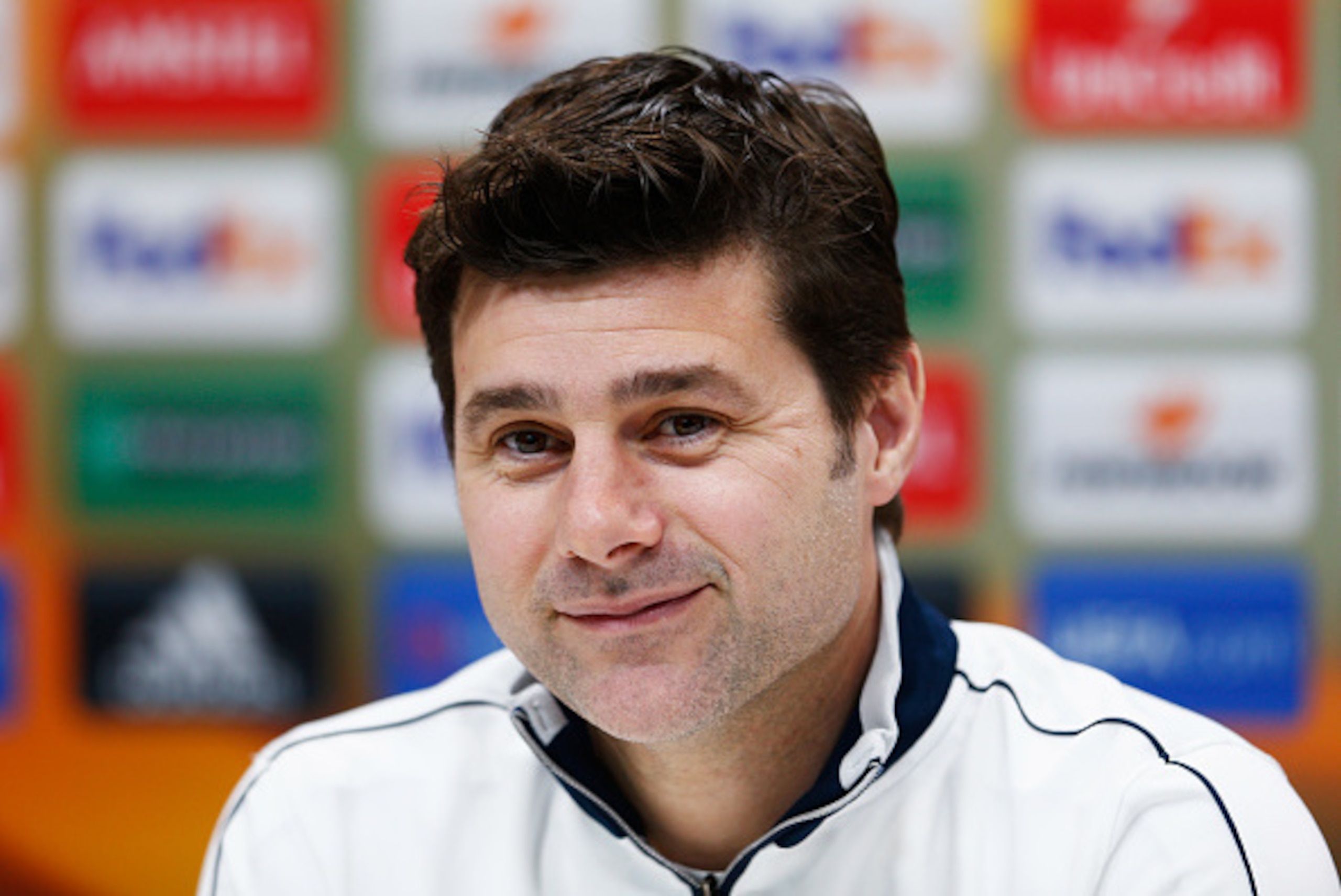 ENFIELD, ENGLAND - FEBRUARY 24: Mauricio Pochettino manager of Tottenham Hotspur looks on during a Tottenham Hotspur press conference ahead of their UEFA Europa League round of 32 second leg match against Fiorentina at the Tottenham Hotspur Training Cent ENFIELD, ENGLAND - FEBRUARY 24: Mauricio Pochettino manager of Tottenham Hotspur looks on during a Tottenham Hotspur press conference ahead of their UEFA Europa League round of 32 second leg match against Fiorentina at the Tottenham Hotspur Training Cent