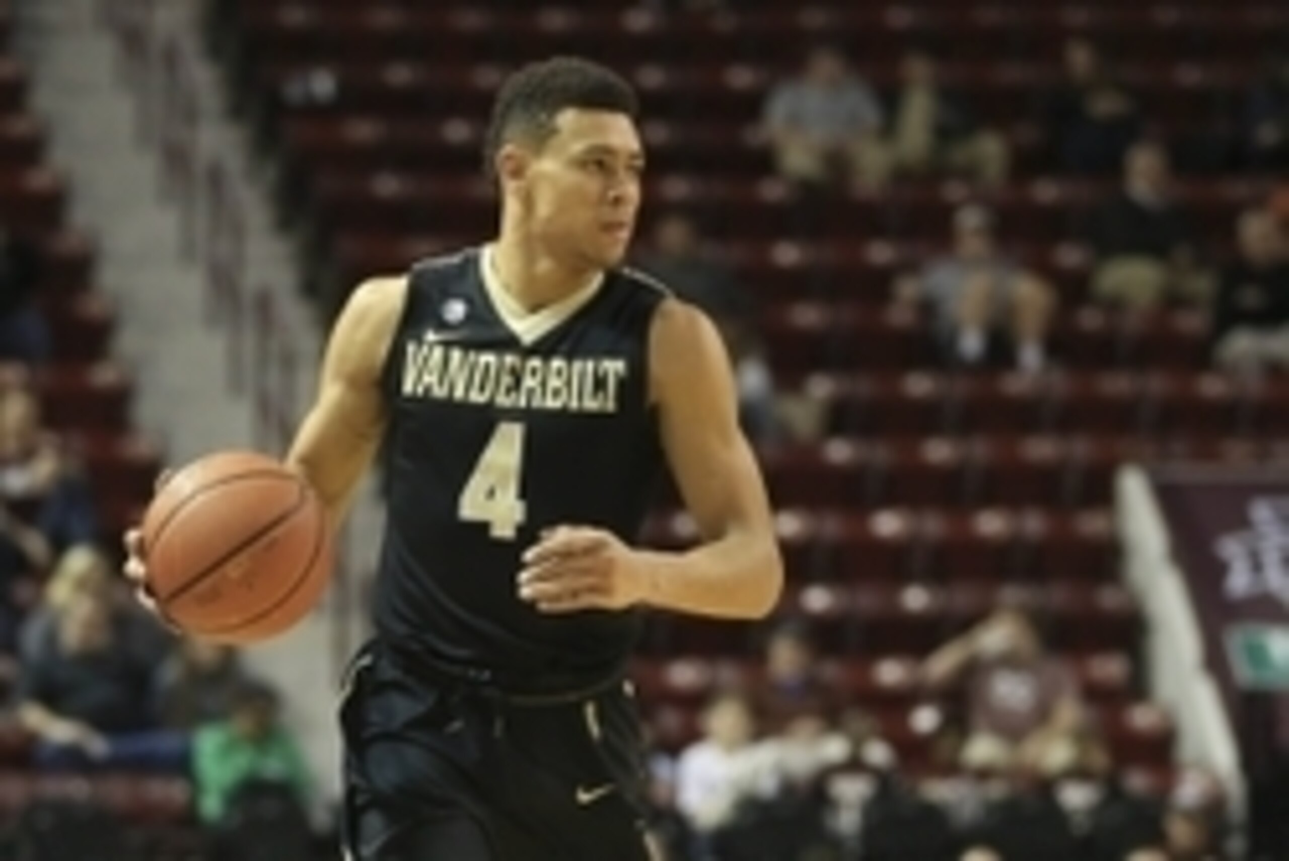 Feb 16, 2016; Starkville, MS, USA; Vanderbilt Commodores guard Wade Baldwin IV (4) brings the ball up court during the first half against the Mississippi State Bulldogs at Humphrey Coliseum. Mandatory Credit: Spruce Derden-USA TODAY Sports