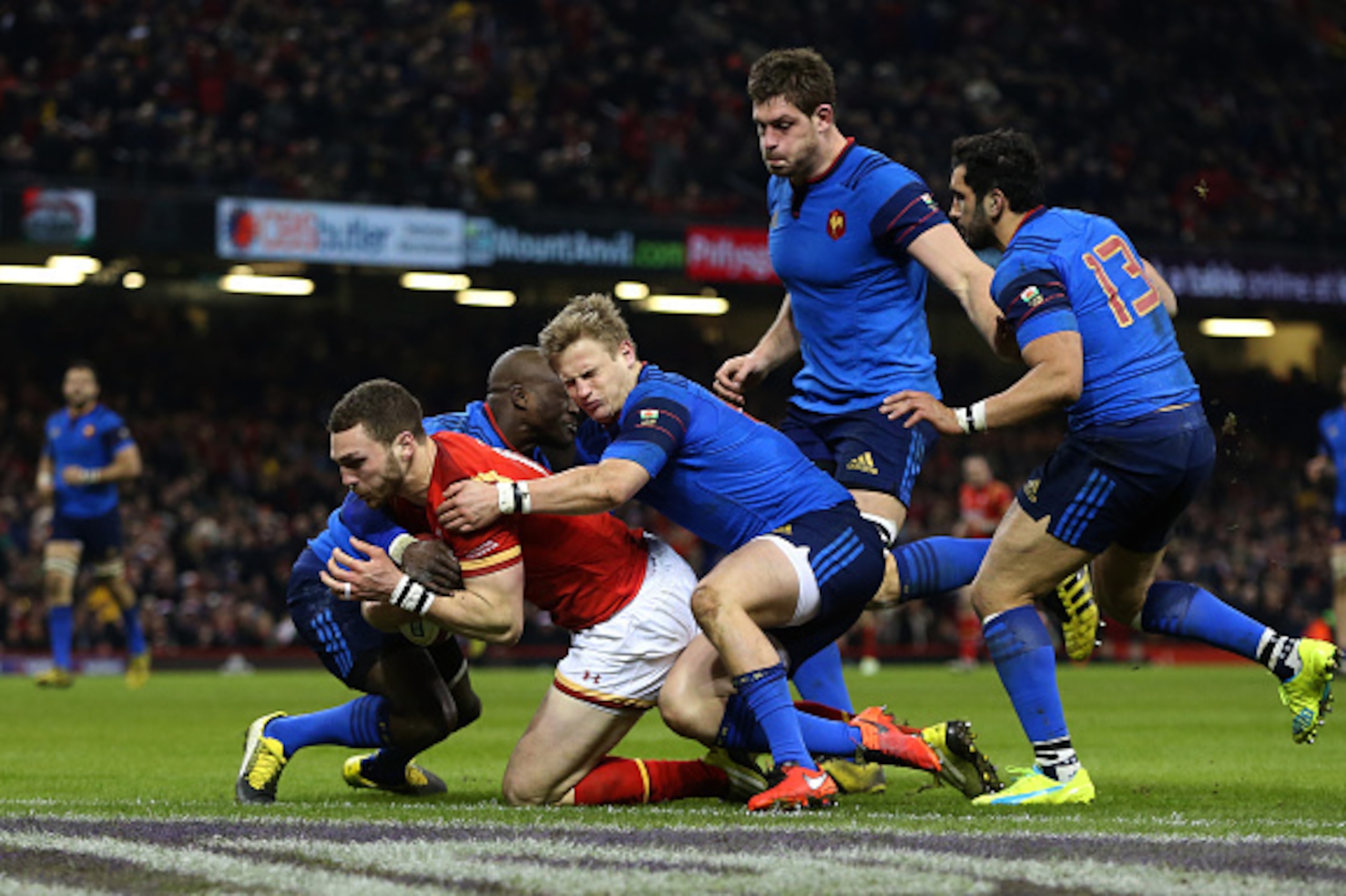 CARDIFF, WALES - FEBRUARY 26:  George North of Wales crashes over the line to score the opening try during the RBS Six Nations match between Wales and France at the Principality Stadium on February 26, 2016 in Cardiff, Wales.  (Photo by David Rogers/Getty